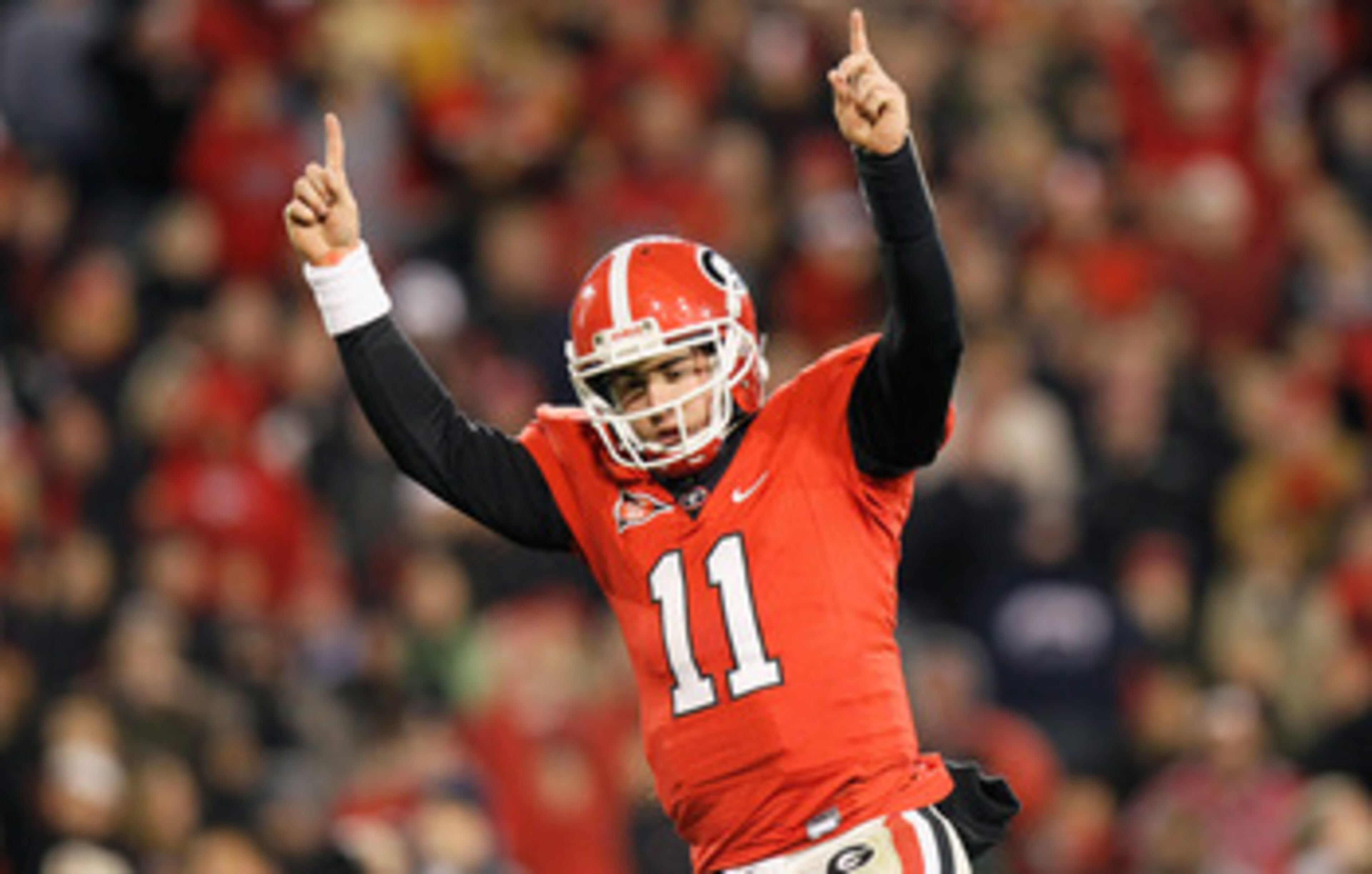 ATHENS, GA - NOVEMBER 27:  Quarterback Aaron Murray #11 of the Georgia Bulldogs reacts after scoring a touchdown against the Georgia Tech Yellow Jackets at Sanford Stadium on November 27, 2010 in Athens, Georgia.  (Photo by Kevin C. Cox/Getty Images)