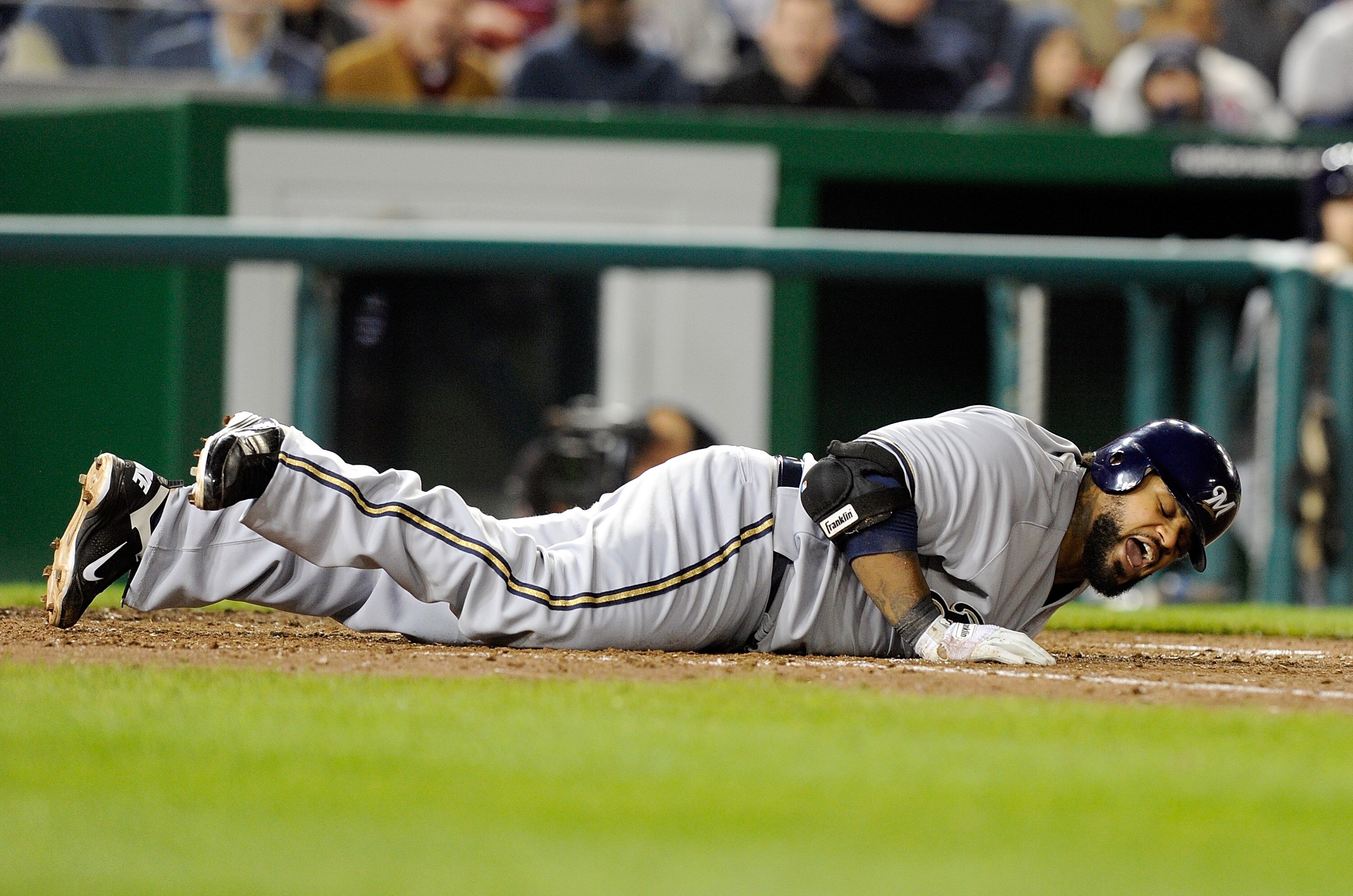 WASHINGTON, DC - APRIL 15:  Prince Fielder #28 of the Milwaukee Brewers reacts after getting hit by a pitch during the game against the Washington Nationals at Nationals Park on April 15, 2011 in Washington, DC. All players, coaches and umpires are wearin