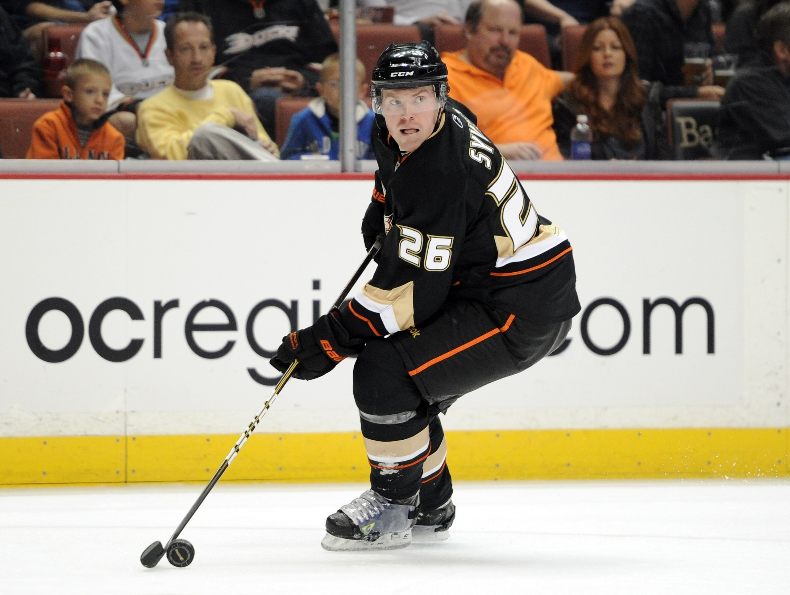 ANAHEIM, CA - OCTOBER 29:  Danny Syvret #26 of Anaheim Ducks controls the puck against the New Jersey Devils at the Honda Center on October 29, 2010 in Anaheim, California.  (Photo by Harry How/Getty Images)