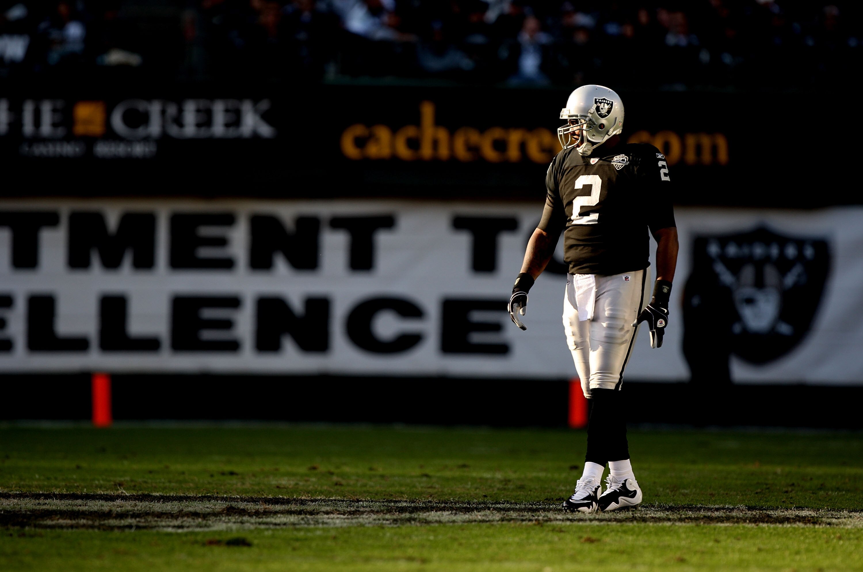 OAKLAND, CA - JANUARY 03:  JaMarcus Russell #2 of the Oakland Raiders looks on against the Baltimore Ravens during an NFL game at Oakland-Alameda County Coliseum on January 3, 2010 in Oakland, California.  (Photo by Jed Jacobsohn/Getty Images)