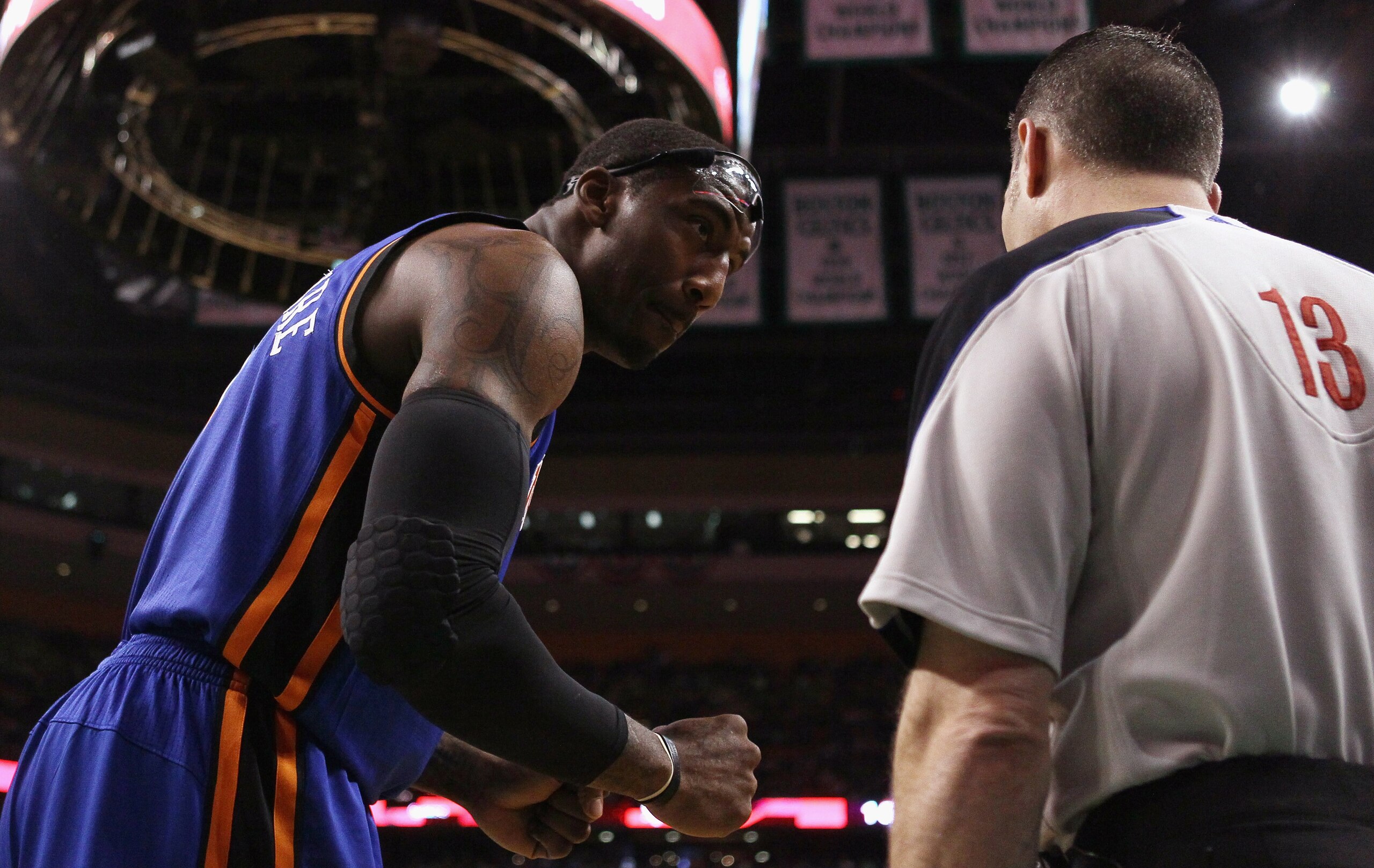 BOSTON, MA - APRIL 17:  Amare Stoudemire #1 of the New York Knicks talks with a referee in Game One of the Eastern Conference Quarterfinals in the 2011 NBA Playoffs on April 17, 2011 at the TD Garden in Boston, Massachusetts. NOTE TO USER: User expressly