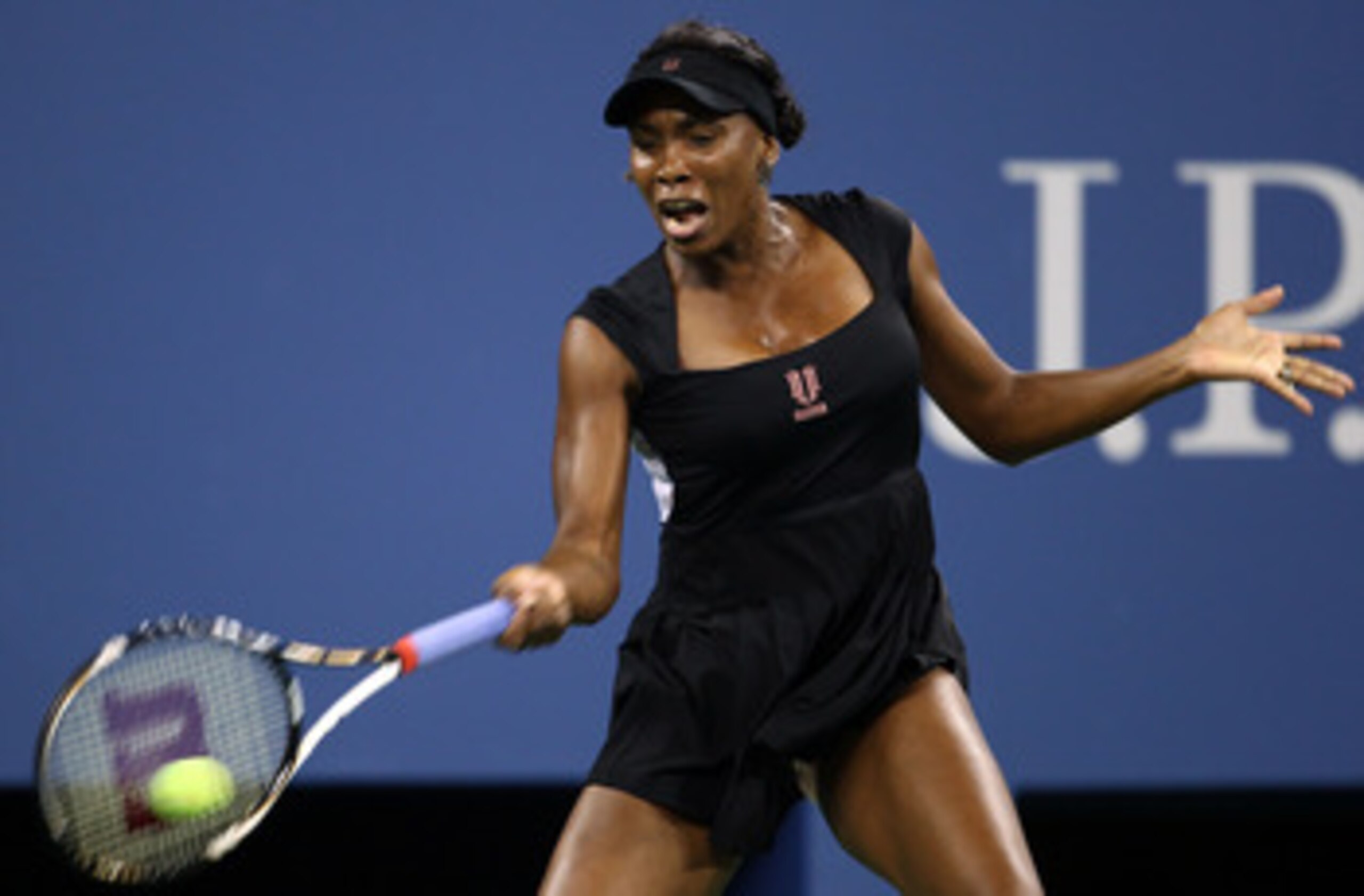 NEW YORK, NY - AUGUST 29:  Venus Williams of the United States returns the ball against Vesna Dolonts of Russia during Day One of the 2011 US Open at the USTA Billie Jean King National Tennis Center on August 29, 2011 in the Flushing neighborhood of the Q