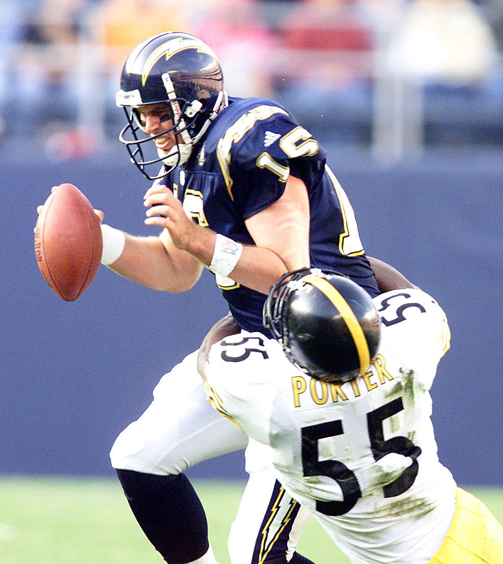24 Dec 2000:  Quarterback Ryan Leaf #16 of the San Diego Chargers is sacked by Joey Porter #55 of the Pittsburgh Steelers during their game at Qualcomm Stadium in San Diego, California.  DIGITAL IMAGE Mandatory Credit: Stephen Dunn/ALLSPORT