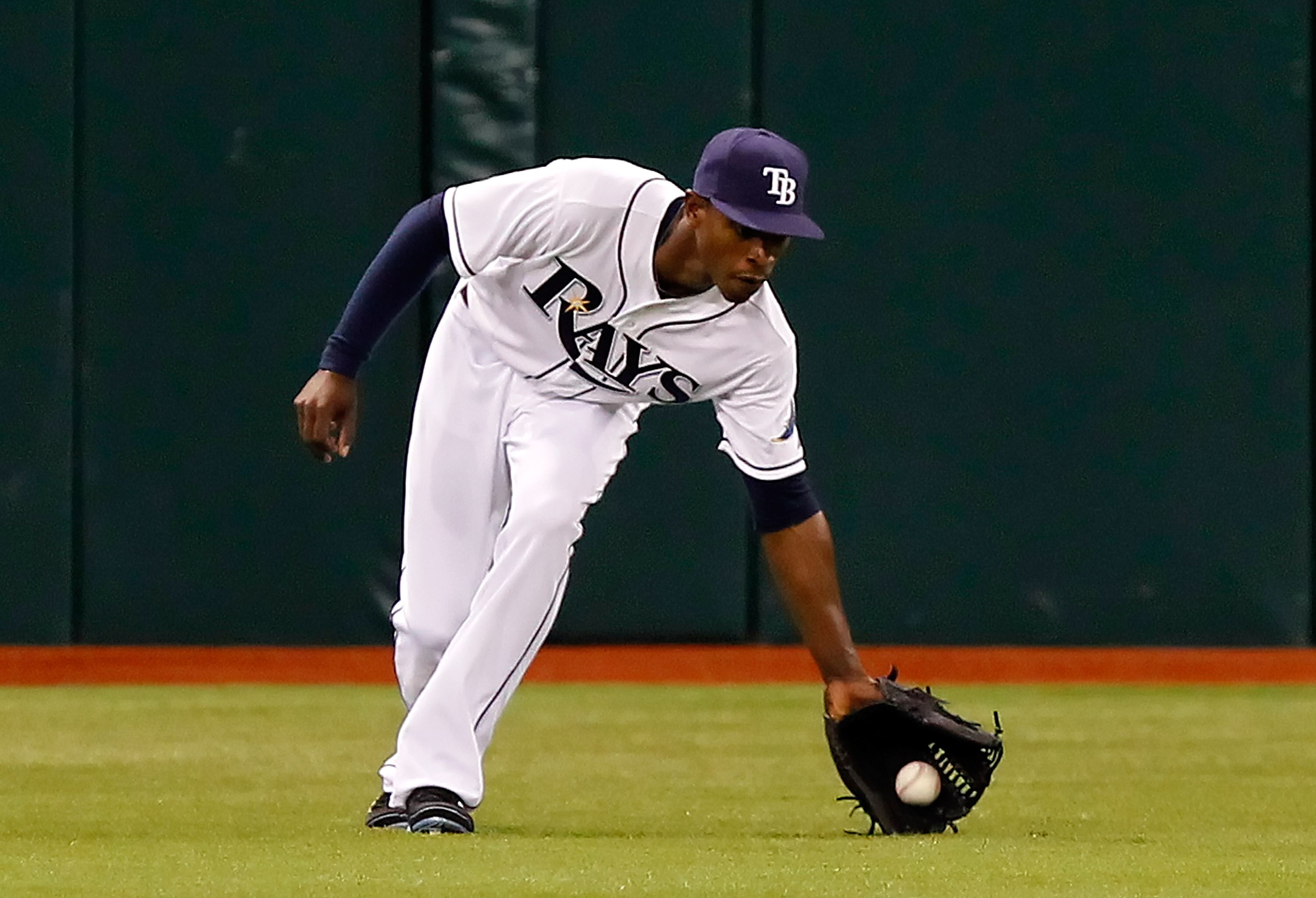 ST. PETERSBURG, FL - APRIL 15:  Outfielder B.J. Upton #2 of the Tampa Bay Rays fields the ball against the Minnesota Twins during the game at Tropicana Field on April 15, 2011 in St. Petersburg, Florida.  (Photo by J. Meric/Getty Images)