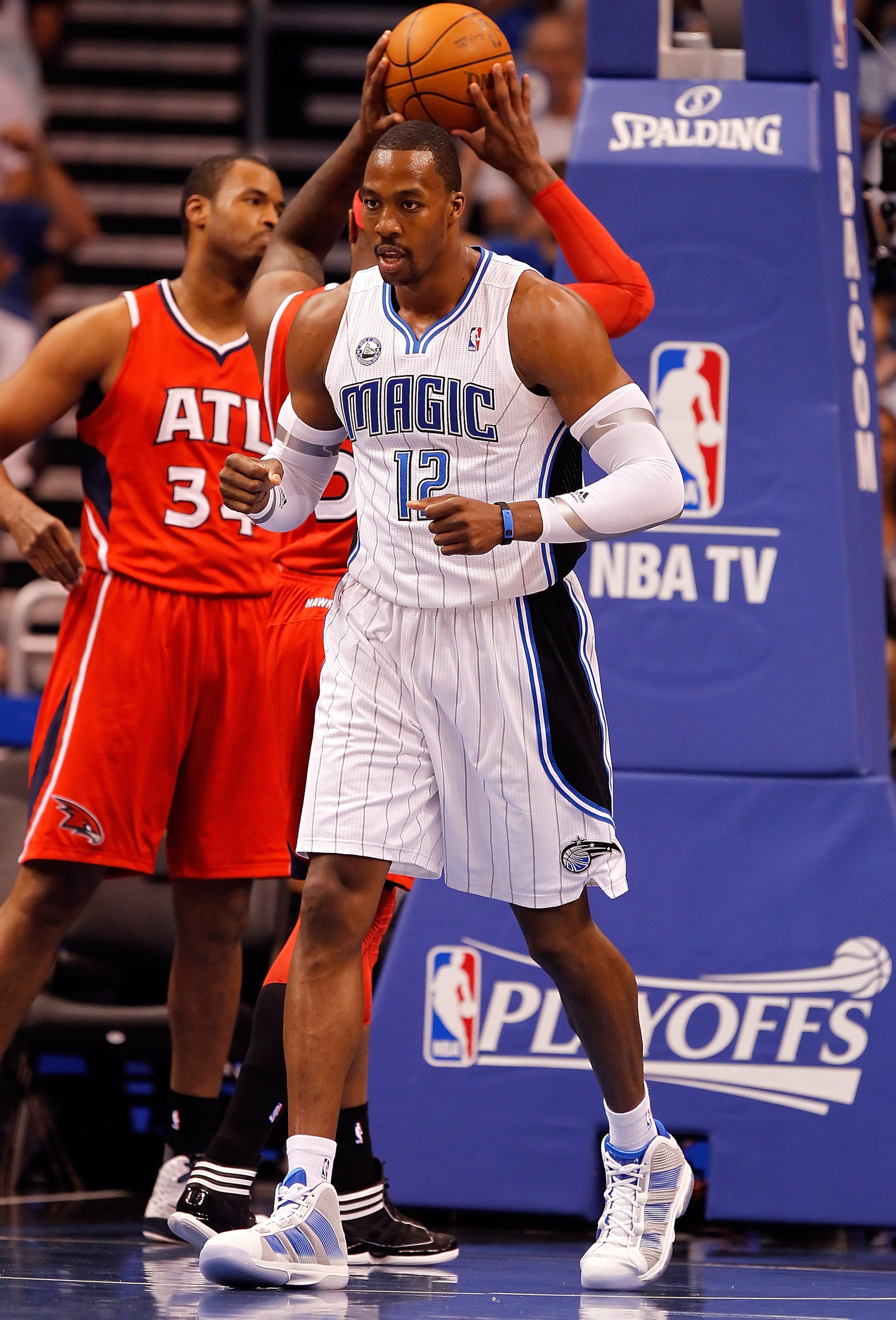 ORLANDO, FL - APRIL 16:  Dwight Howard #12 of the Orlando Magic is pumped up after a shot against the Atlanta Hawks during Game One of the Eastern Conference Quarterfinals of the 2011 NBA Playoffs on April 16, 2011 at the Amway Arena in Orlando, Florida.