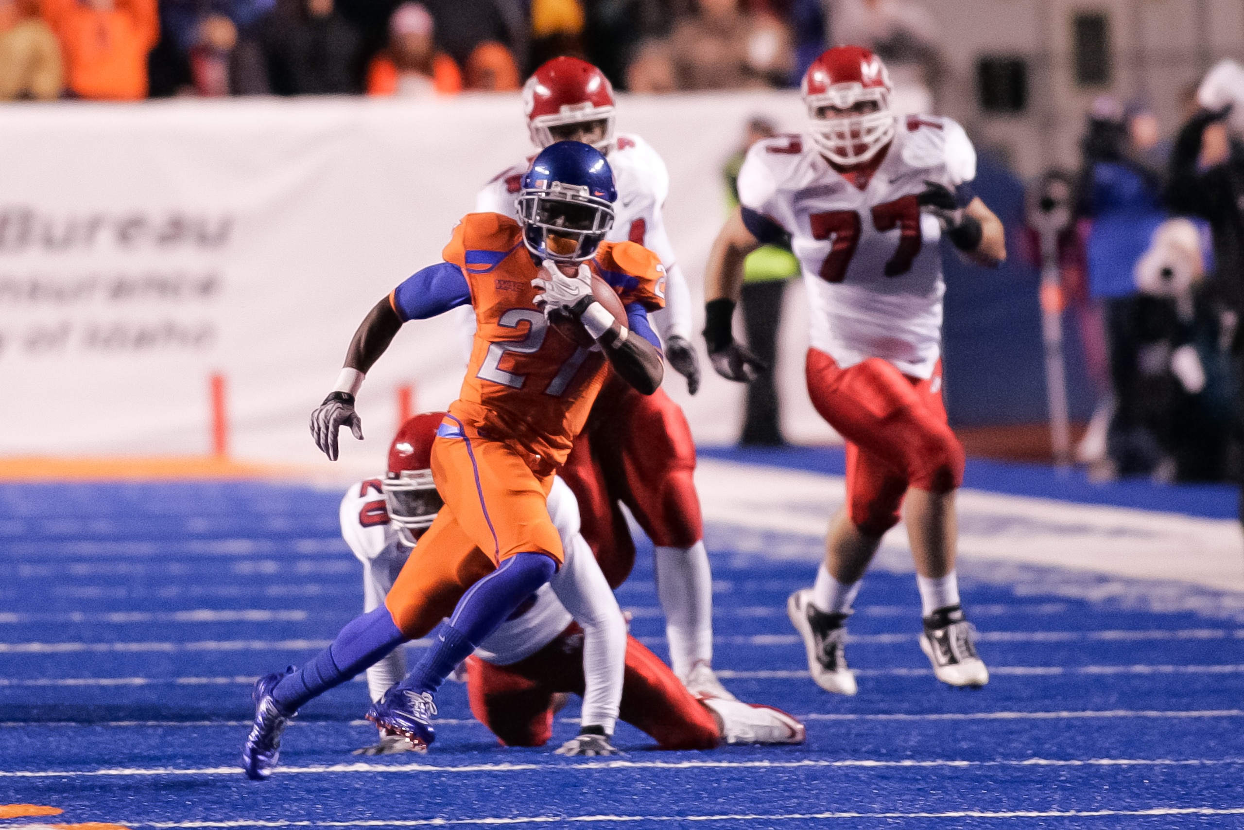 BOISE, ID - NOVEMBER 19:  Jeremy Avery #27 of the Boise State Broncos runs the ball against the Fresno State Bulldogs at Bronco Stadium on November 19, 2010 in Boise, Idaho.  (Photo by Otto Kitsinger III/Getty Images)