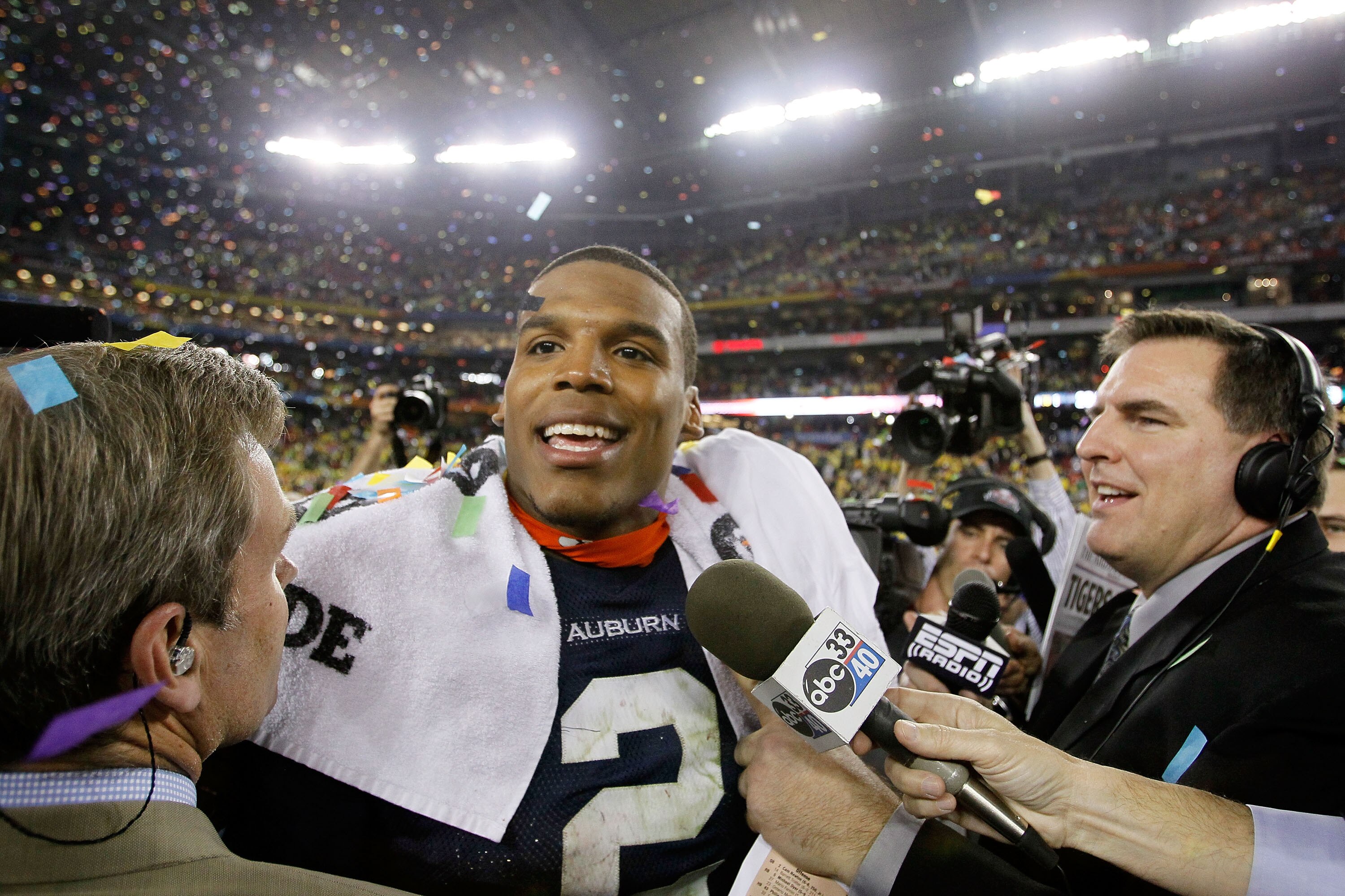 GLENDALE, AZ - JANUARY 10: Quarterback Cameron Newton #2 of the Auburn Tigers celebrates the Tigers 22-19 victory against the Oregon Ducks in the Tostitos BCS National Championship Game at University of Phoenix Stadium on January 10, 2011 in Glendale, Ar GLENDALE, AZ - JANUARY 10: Quarterback Cameron Newton #2 of the Auburn Tigers celebrates the Tigers 22-19 victory against the Oregon Ducks in the Tostitos BCS National Championship Game at University of Phoenix Stadium on January 10, 2011 in Glendale, Ar