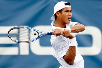 WASHINGTON, DC - AUGUST 04: Somdev Devvarman of India returns a shot to Marcos Baghdatis of Cyprus during the Legg Mason Tennis Classic presented by Geico at the William H.G. FitzGerald Tennis Center on August 4, 2011 in Washington, DC.  (Photo by Matthew