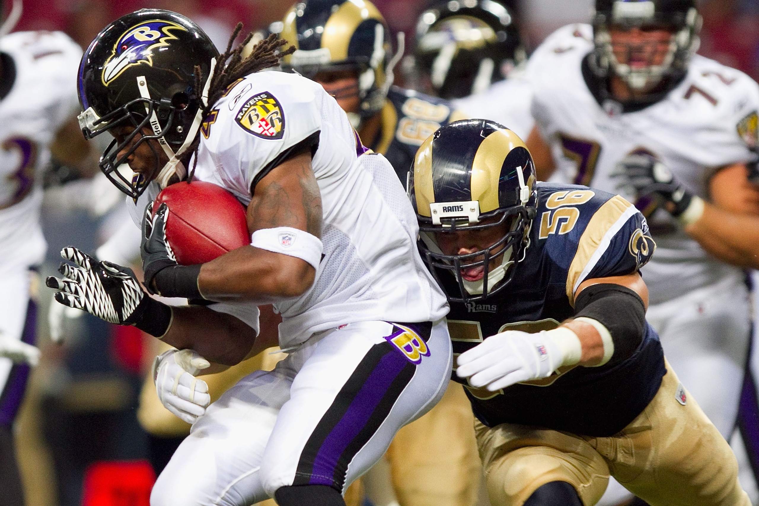ST. LOUIS - SEPTEMBER 2: Josh Hull #56 of the St. Louis Rams tackles Curtis Steele #42 of the Baltimore Ravens during an NFL preseason game at the Edward Jones Dome on September 2, 2010 in St. Louis, Missouri. The Rams beat the Ravens 27-21. (Photo by D ST. LOUIS - SEPTEMBER 2: Josh Hull #56 of the St. Louis Rams tackles Curtis Steele #42 of the Baltimore Ravens during an NFL preseason game at the Edward Jones Dome on September 2, 2010 in St. Louis, Missouri. The Rams beat the Ravens 27-21. (Photo by D
