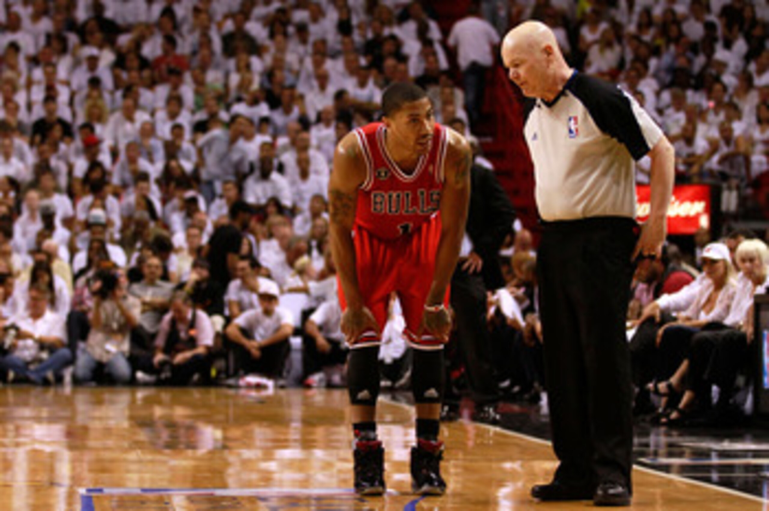 MIAMI, FL - MAY 24:  Derrick Rose #1 of the Chicago Bulls talks with referee Joey Crawford against the Miami Heat in Game Four of the Eastern Conference Finals during the 2011 NBA Playoffs on May 24, 2011 at American Airlines Arena in Miami, Florida. NOTE
