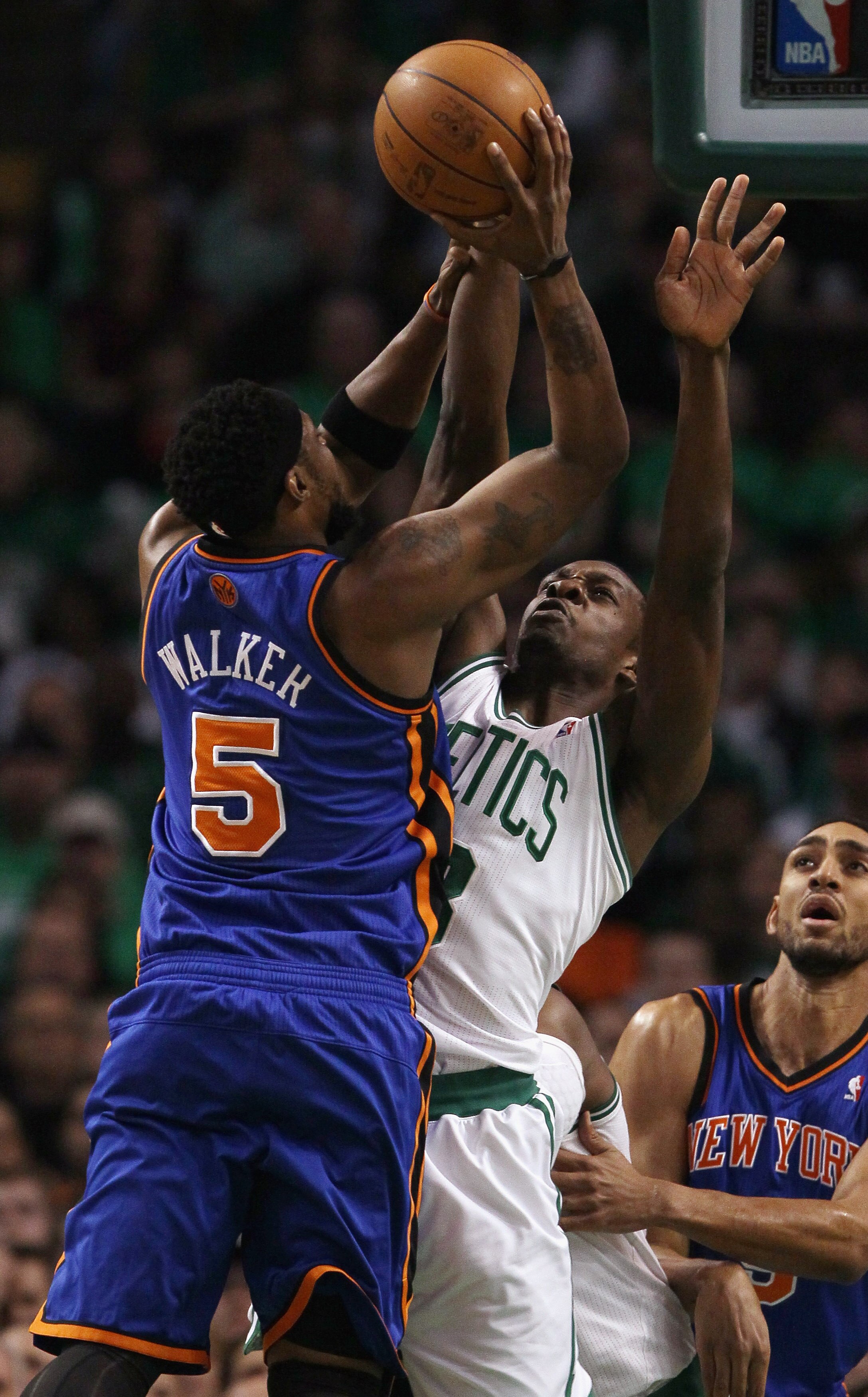 BOSTON, MA - APRIL 17:  Bill Walker #5 of the New York Knicks shoots over Jeff Green #8 of the Boston Celtics in Game One of the Eastern Conference Quarterfinals in the 2011 NBA Playoffs on April 17, 2011 at the TD Garden in Boston, Massachusetts. NOTE TO