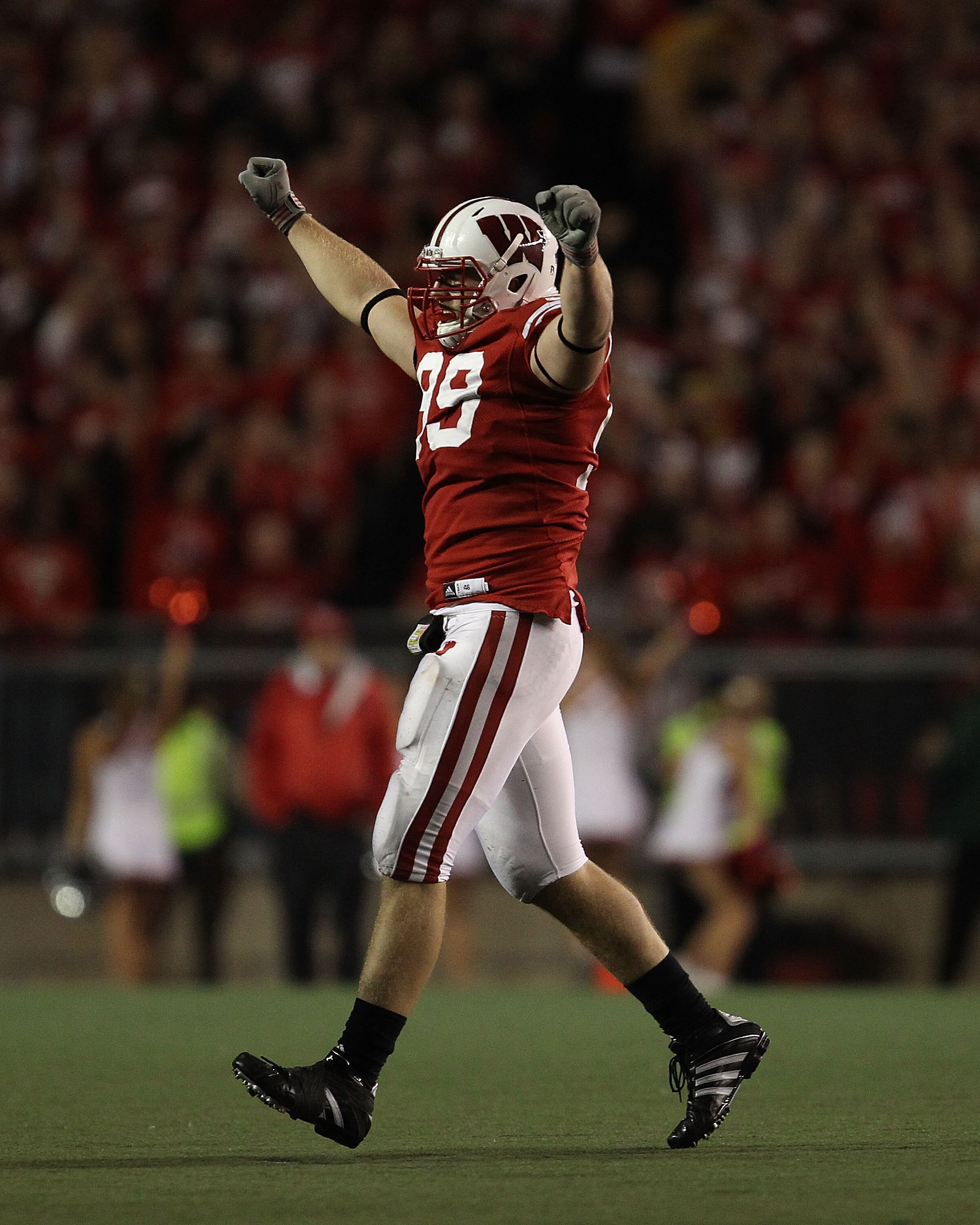 MADISON, WI - OCTOBER 16: J.J. Watt #99 of the Wisconsin Badgers celebrates a sack against the Ohio State Buckeyes at Camp Randall Stadium on October 16, 2010 in Madison, Wisconsin. Wisconsin defeated Ohio State 31-18. (Photo by Jonathan Daniel/Getty Imag MADISON, WI - OCTOBER 16: J.J. Watt #99 of the Wisconsin Badgers celebrates a sack against the Ohio State Buckeyes at Camp Randall Stadium on October 16, 2010 in Madison, Wisconsin. Wisconsin defeated Ohio State 31-18. (Photo by Jonathan Daniel/Getty Imag