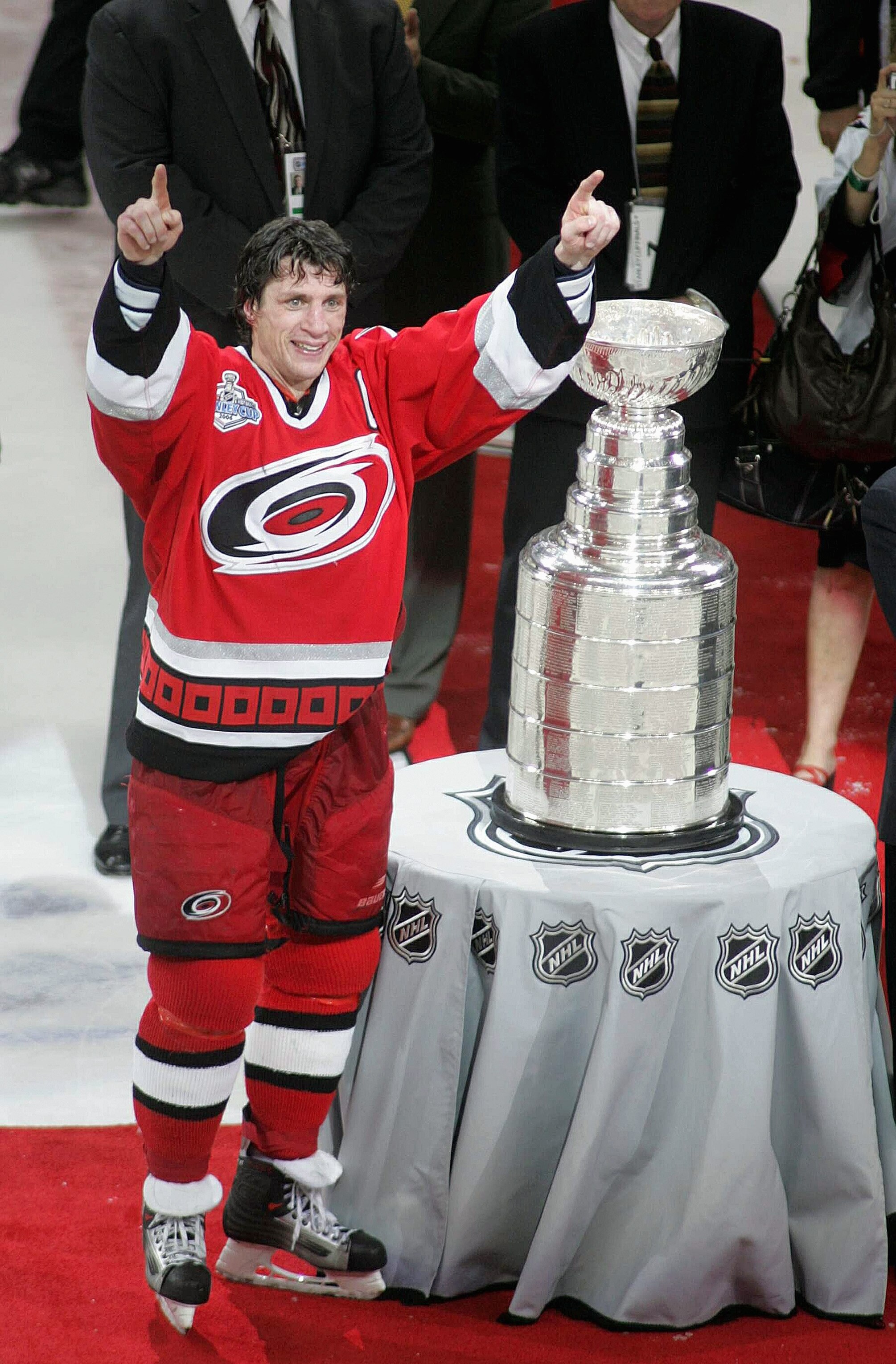 RALEIGH, NC - JUNE 19:  Rod Brind'Amour #17 of the Carolina Hurricanes gives the thumbs up while standing next to the Stanley Cup after the Hurricanes defeated the Edmonton Oilers in game seven of the 2006 NHL Stanley Cup Finals on June 19, 2006 at the RB