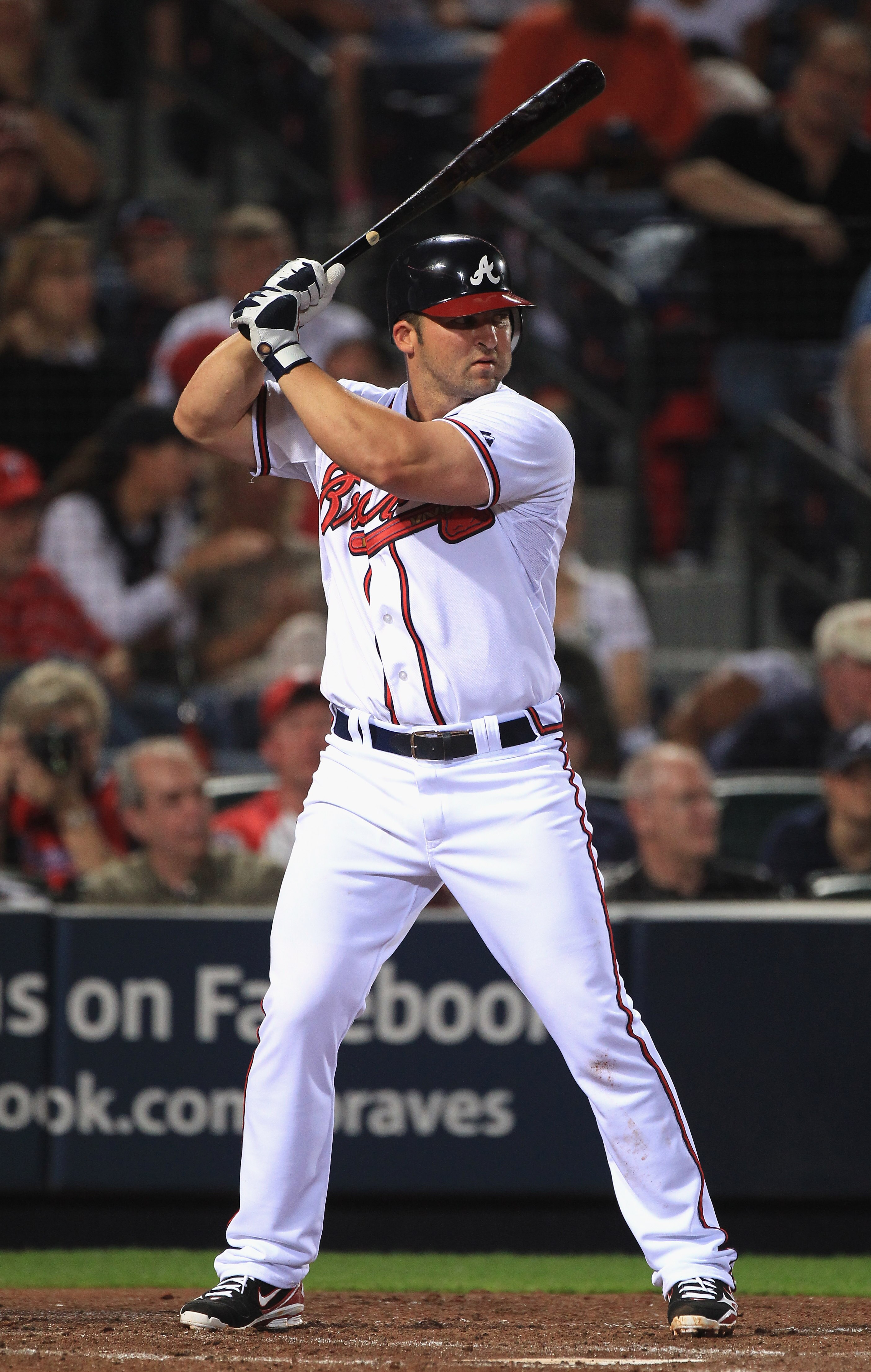 ATLANTA, GA - APRIL 08:  Dan Uggla #26 of the Atlanta Braves during their opening day game against the Philadelphia Phillies at Turner Field on April 8, 2011 in Atlanta, Georgia.  (Photo by Streeter Lecka/Getty Images)