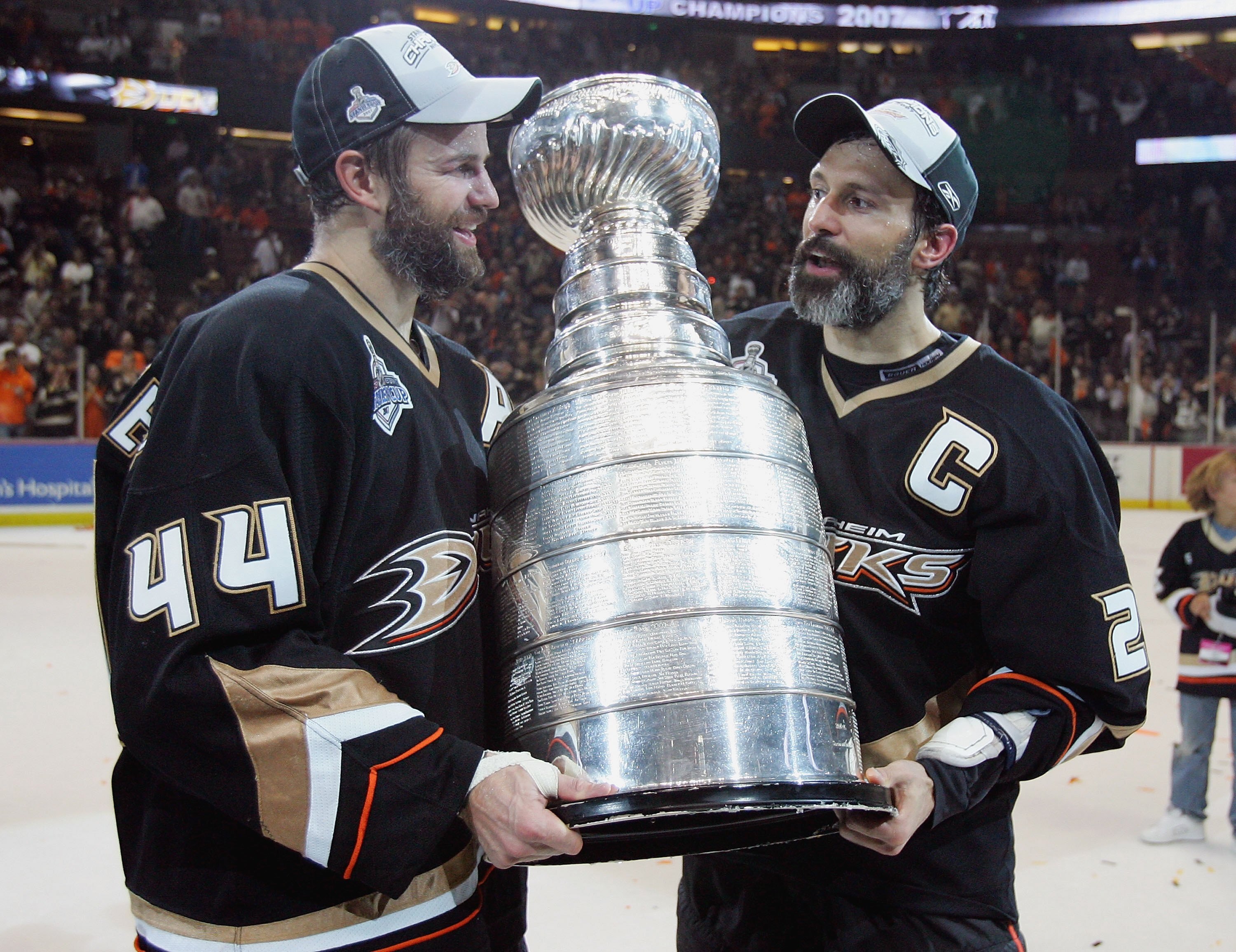 ANAHEIM, CA - JUNE 06: Rob Niedermayer #44 of the Anaheim Ducks and brother Scott Niedermayer #27 hoist the Stanley Cup after their team's victory over the Ottawa Senators in Game Five of the Stanley Cup Finals on June 6, 2007 at Honda Center in Anaheim,