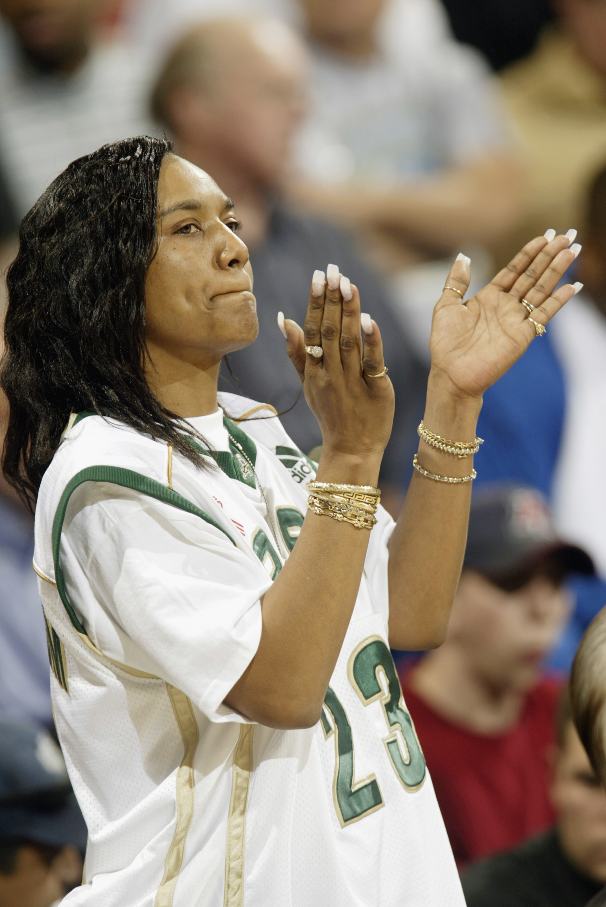LOS ANGELES - JANUARY 4:  Gloria James, mother of LeBron James #23 of St. Vincent-St. Mary's High School, cheers on her son during the Ninth Annual Pangos Dream Classic game against Mater Dei High School at UCLA's Pauley Pavilion on January 4, 2003 in Los