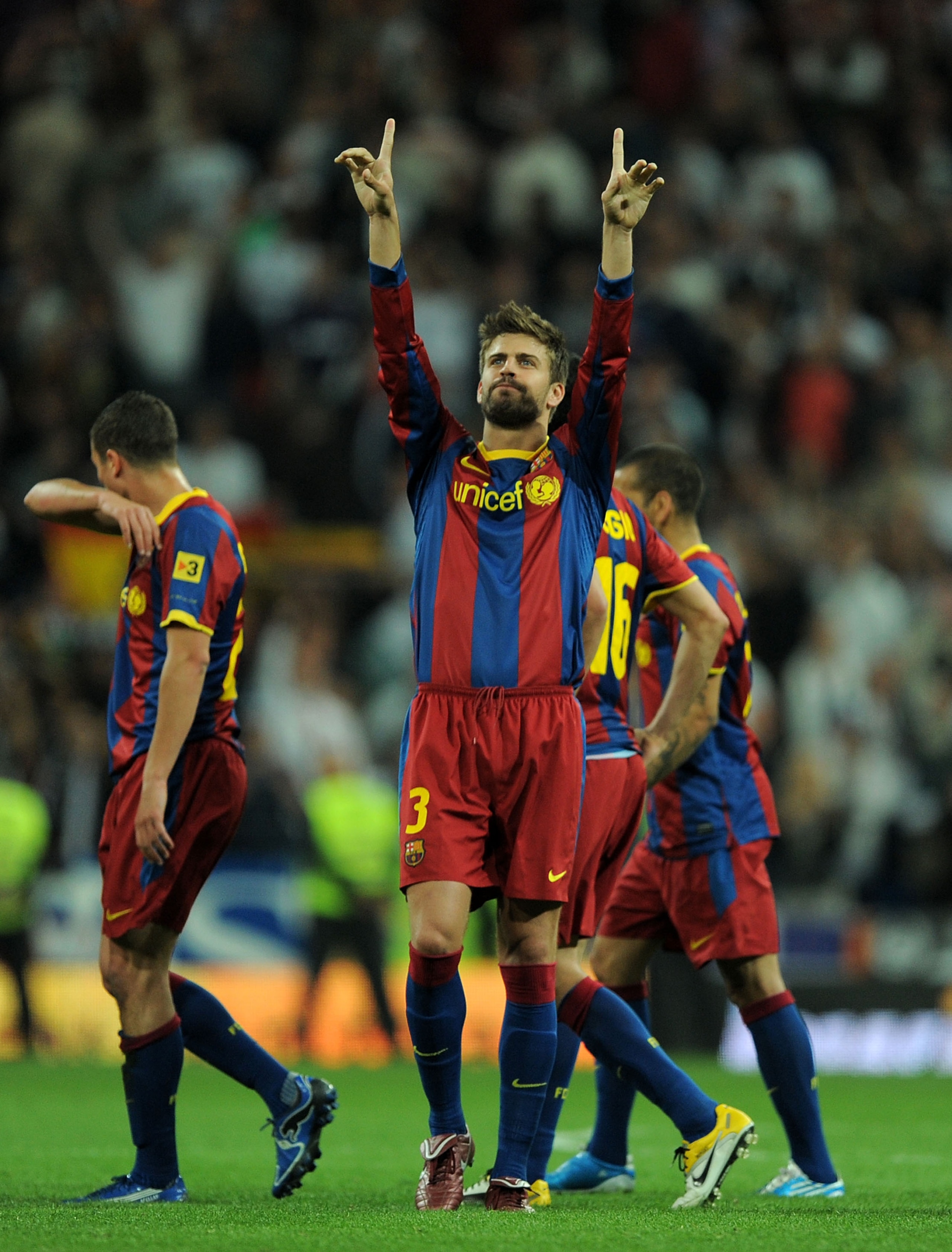 MADRID, SPAIN - APRIL 16:  Gerard Pique of Barcelona applaud after drawing 1-1 against Real Madrid  during the La Liga match between Real Madrid and Barcelona at Estadio Santiago Bernabeu on April 16, 2011 in Madrid, Spain.  (Photo by Denis Doyle/Getty Im