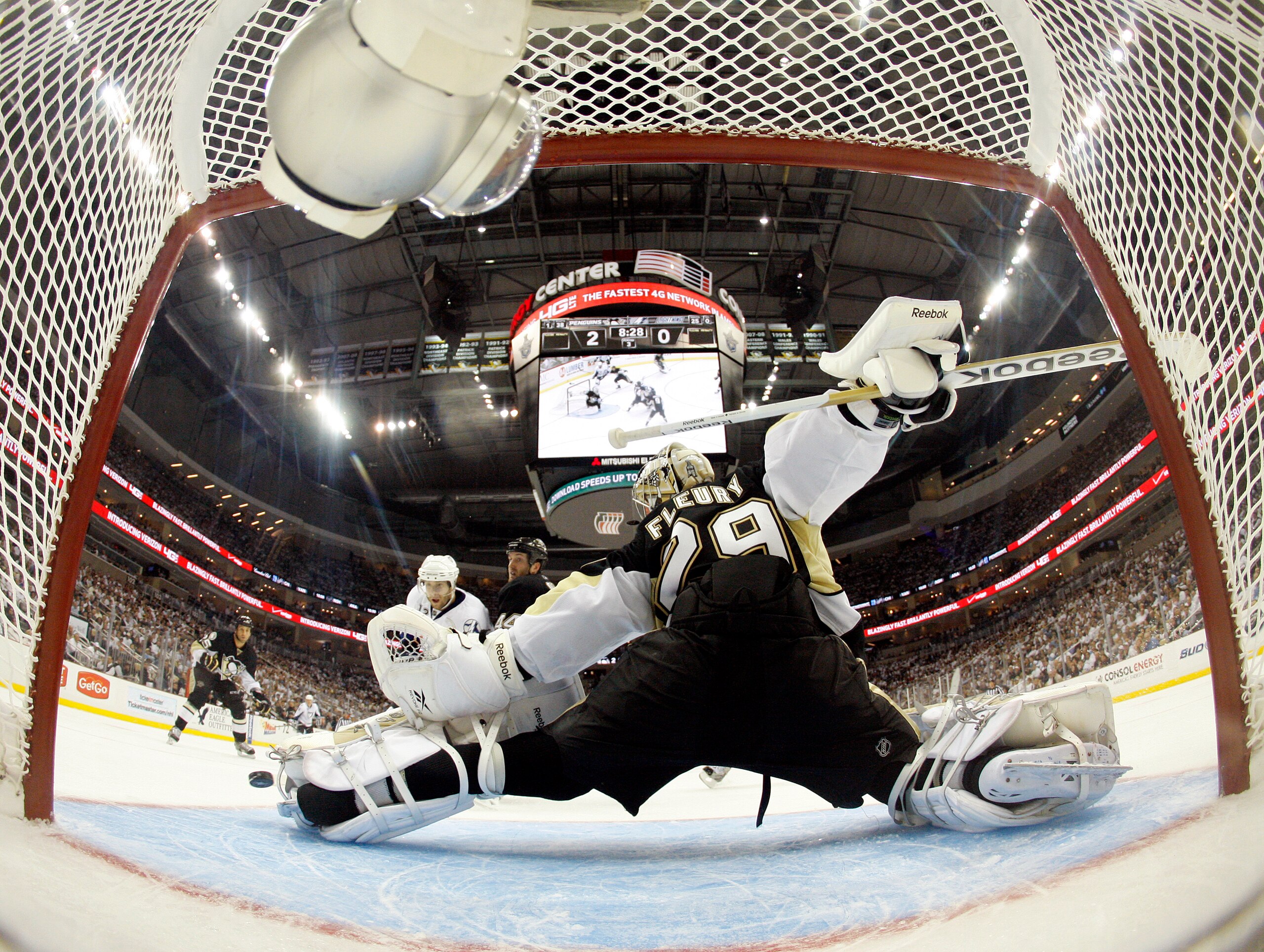 PITTSBURGH, PA - APRIL 13: Marc-Andre Fleury #29 of the Pittsburgh Penguins makes a kick save against the Tampa Bay Lightning in Game One of the Eastern Conference Quarterfinals during the 2011 NHL Stanley Cup Playoffs at Consol Energy Center on April 13,