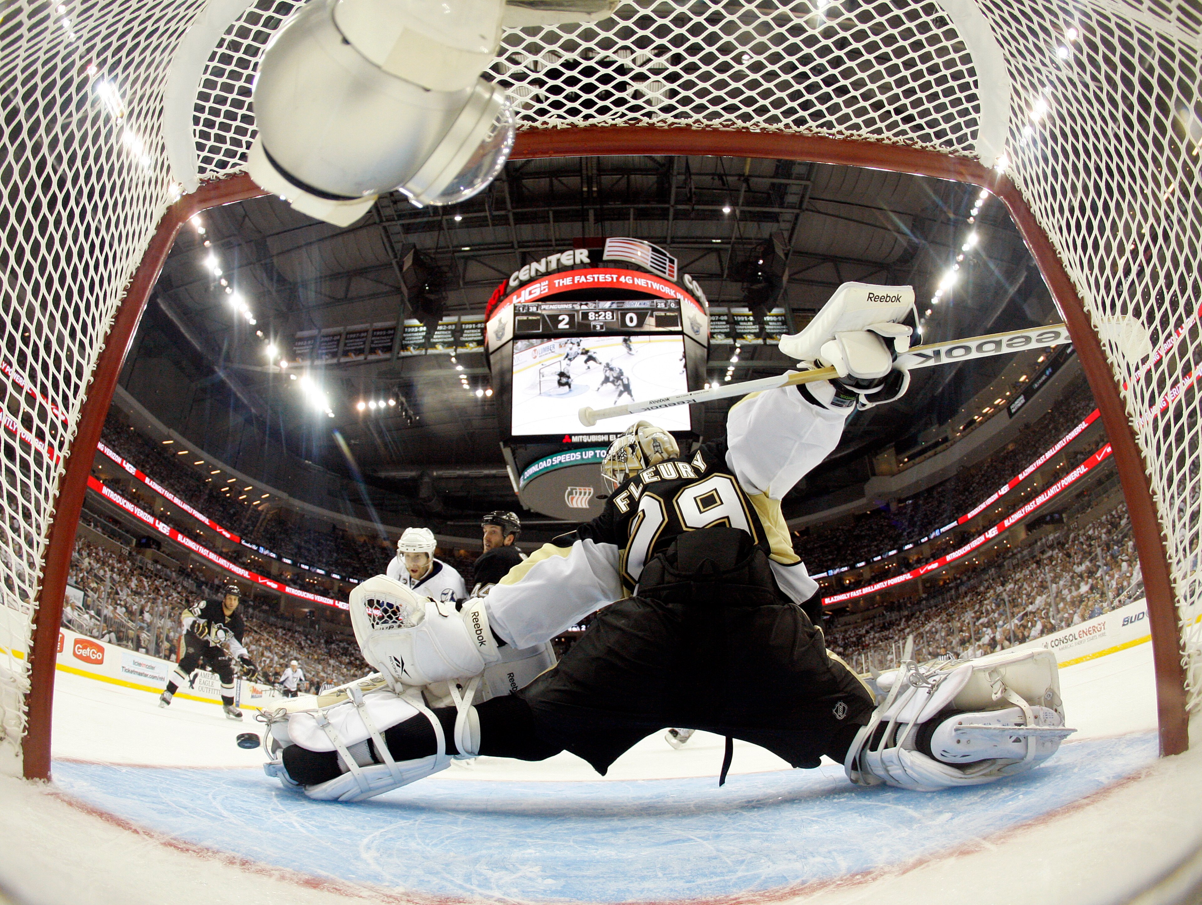 PITTSBURGH, PA - APRIL 13: Marc-Andre Fleury #29 of the Pittsburgh Penguins makes a kick save against the Tampa Bay Lightning in Game One of the Eastern Conference Quarterfinals during the 2011 NHL Stanley Cup Playoffs at Consol Energy Center on April 13, PITTSBURGH, PA - APRIL 13: Marc-Andre Fleury #29 of the Pittsburgh Penguins makes a kick save against the Tampa Bay Lightning in Game One of the Eastern Conference Quarterfinals during the 2011 NHL Stanley Cup Playoffs at Consol Energy Center on April 13,