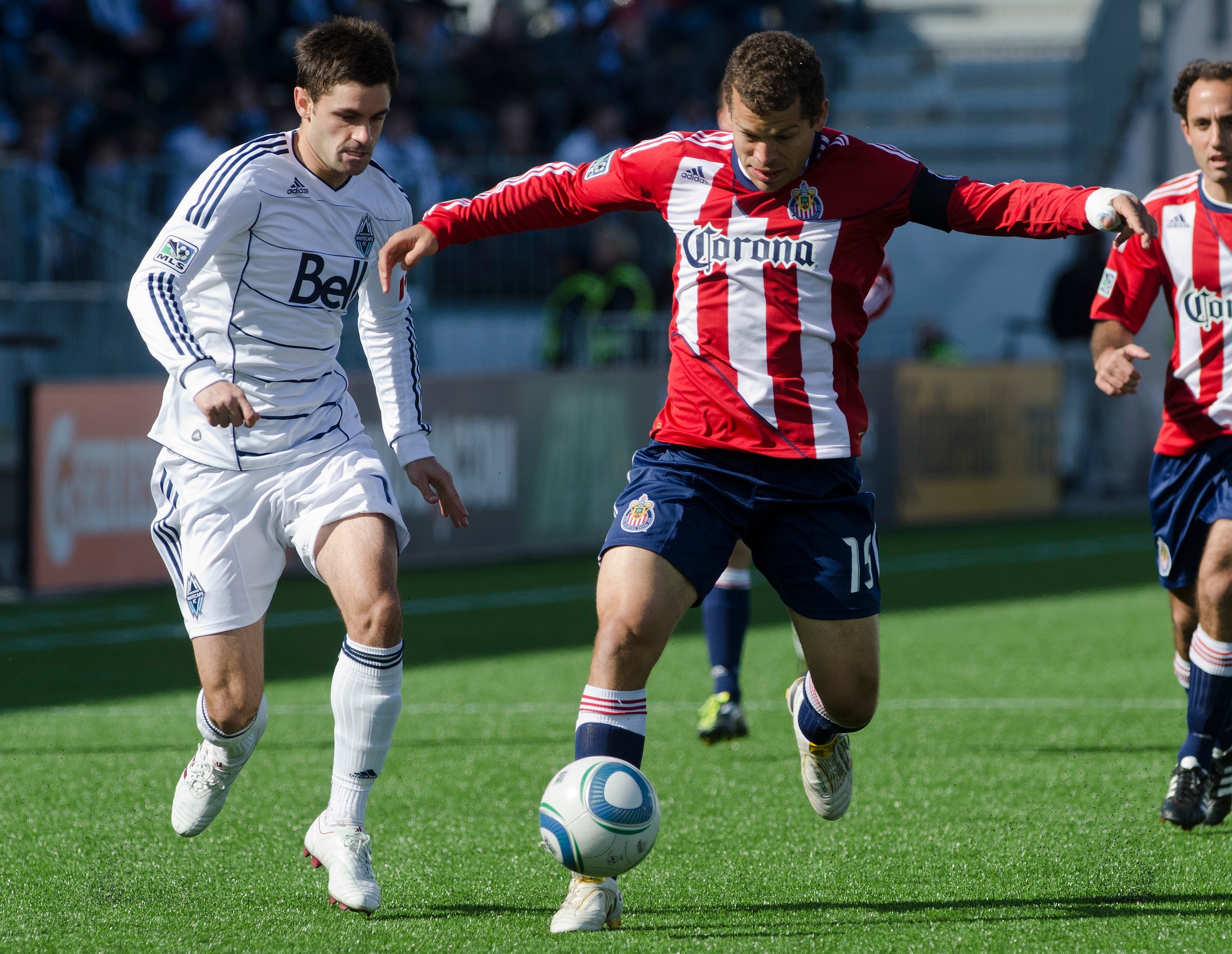 VANCOUVER, CANADA - APRIL 16: Blake Wagner #19 of the Vancouver Whitecaps FC tries to chase down Alejandro Moreno #15 of the Chivas USA during the first half in MLS action on April 16, 2011 at Empire Field in Vancouver, BC, Canada.  (Photo by Rich Lam/Get