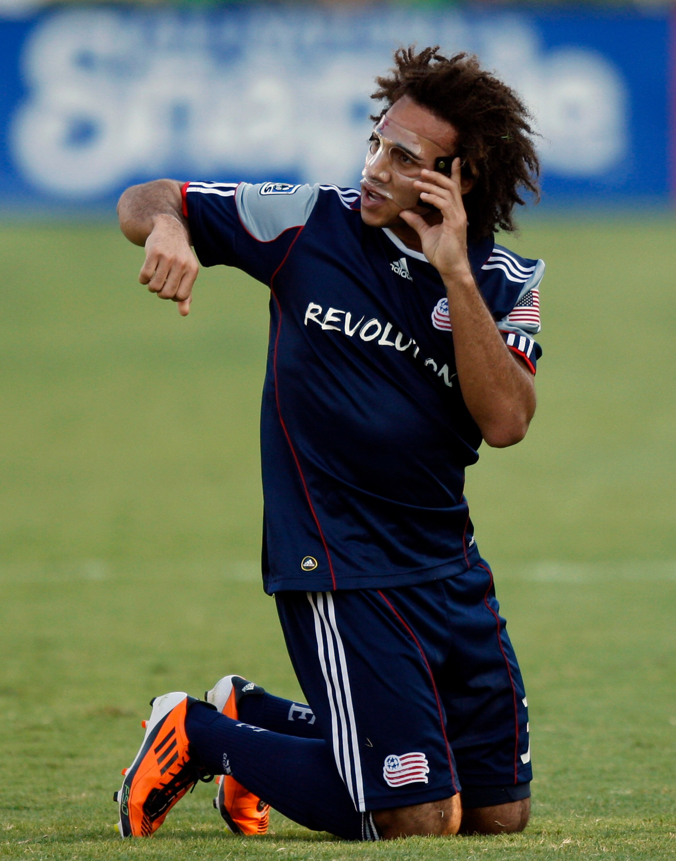 HOUSTON - APRIL 17:  Defender Kevin Alston #30 of the New England Revolution complains he was elbowed in the face by a Houston Dynamo player in the first half at Robertson Stadium on April 17, 2011 in Houston, Texas.  (Photo by Bob Levey/Getty Images)