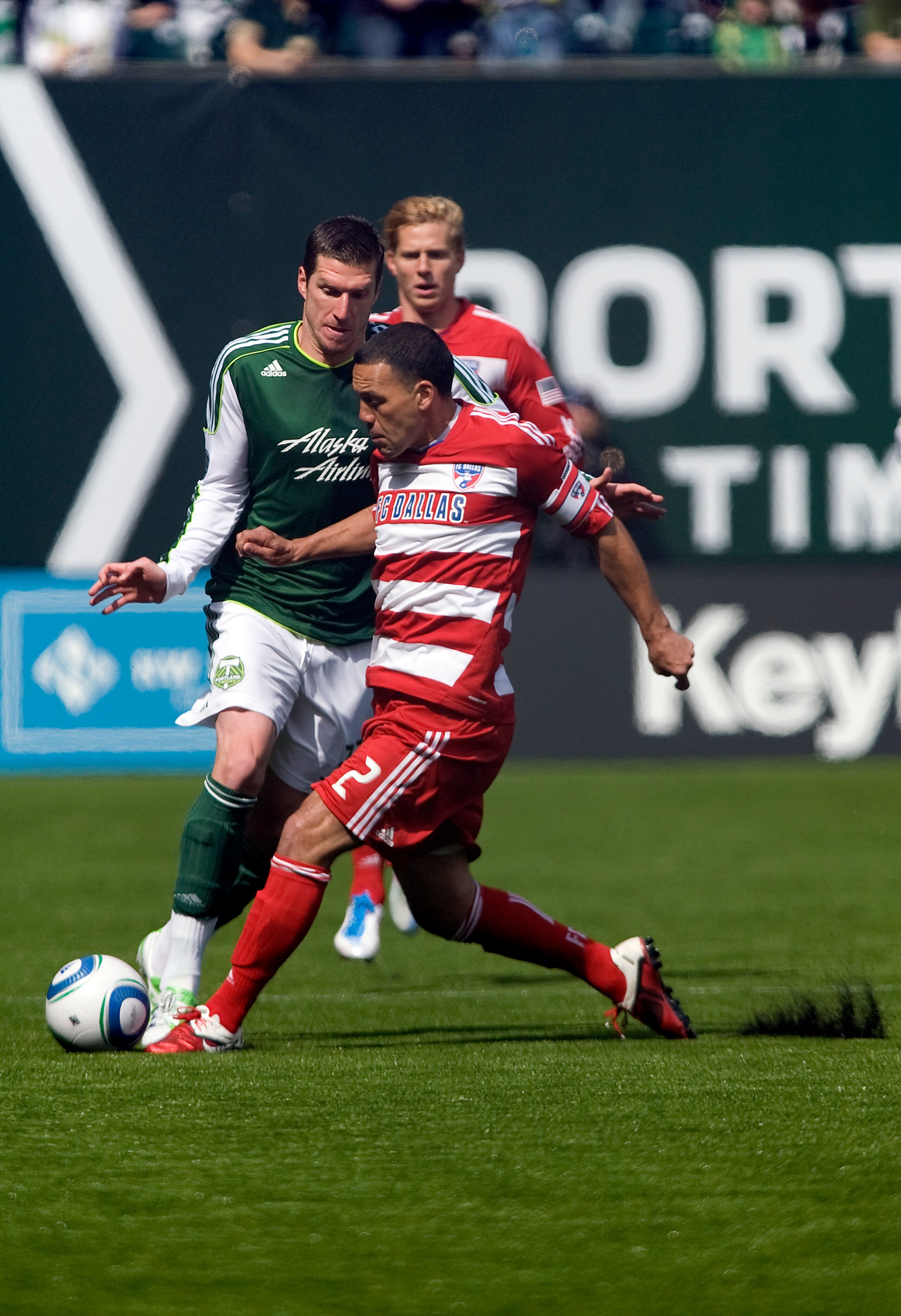 PORTLAND, OR - APRIL 17:  Daniel Hernandez #2 of FC Dallas steals the ball from Kenny Cooper #33 of the Portland Timbers during the first half of the game at Jeld-Wen Field on April 17, 2011 in Portland, Oregon. The Timbers won the game 3-2. (Photo by Ste