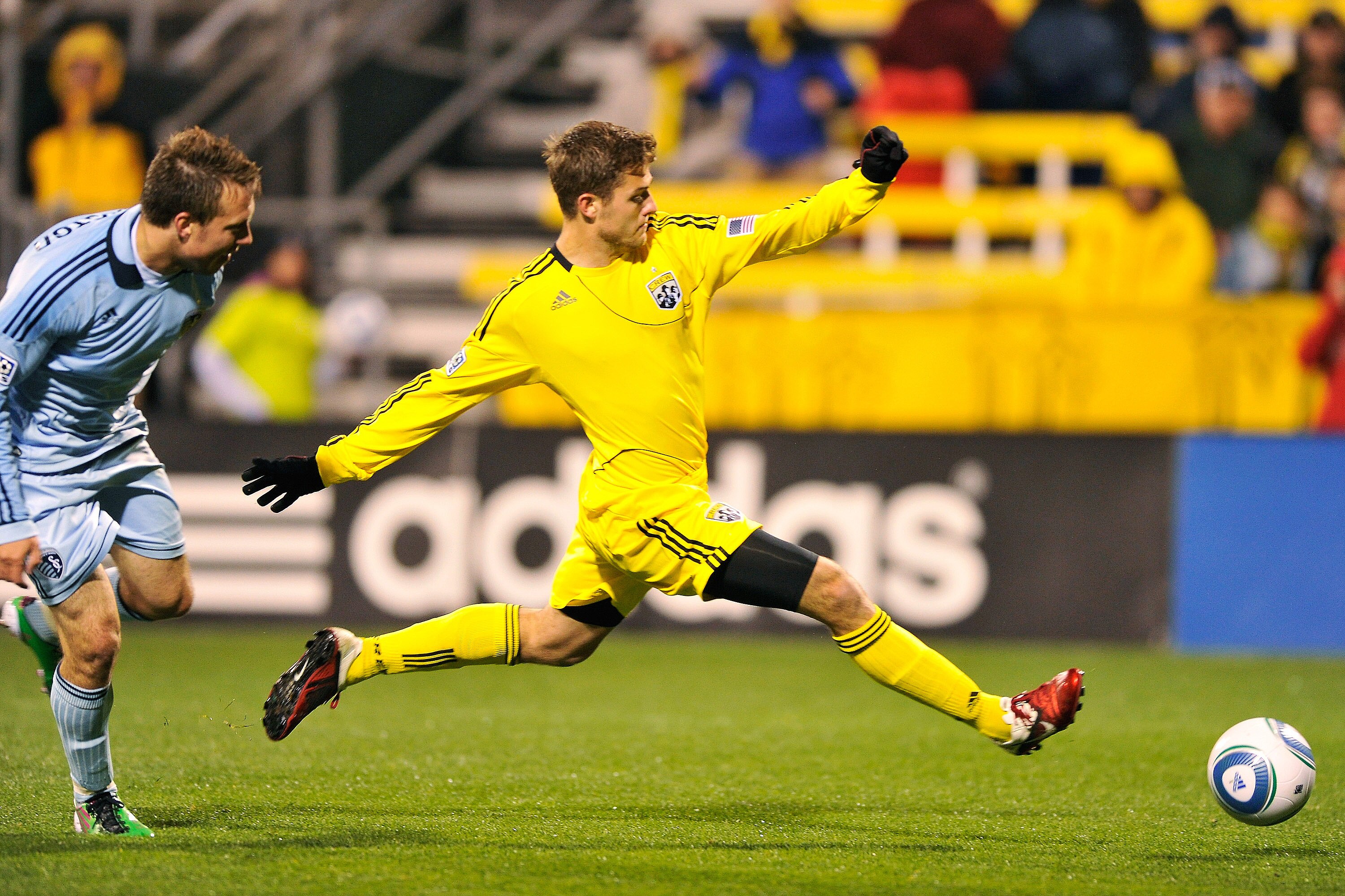 COLUMBUS, OH - APRIL 16:  Robbie Rogers #18 of the Columbus Crew leaps to make the kick to score the only goal during a 1-0 Columbus victory over Sporting Kansas City on April 16, 2011 at Crew Stadium in Columbus, Ohio.  (Photo by Jamie Sabau/Getty Images