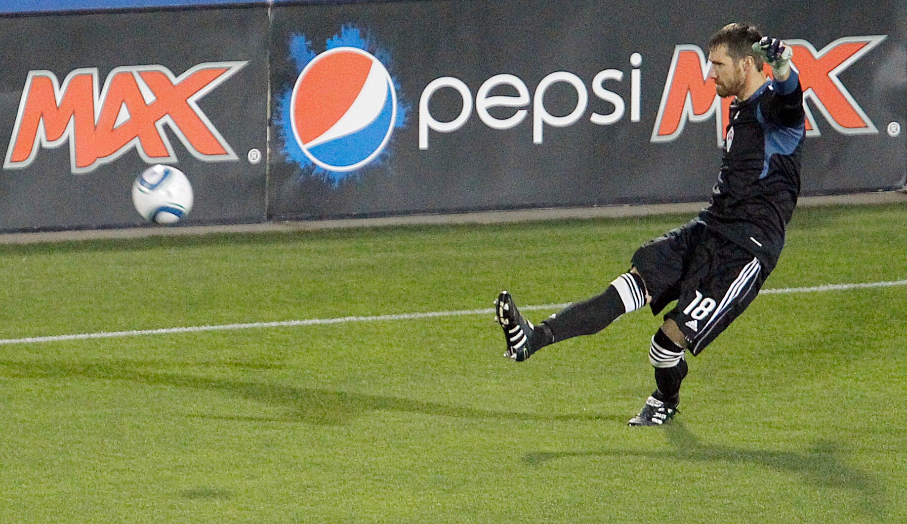 FRISCO, TX - APRIL 8: Goal keeper Matt Pickens #18 of the Colorado Rapids clears the ball from the defensive zone during the second half of a soccer game against FC Dallas at Pizza Hut Park on April 8, 2011 in Frisco, Texas. FC Dallas won 3-0. (Photo by B