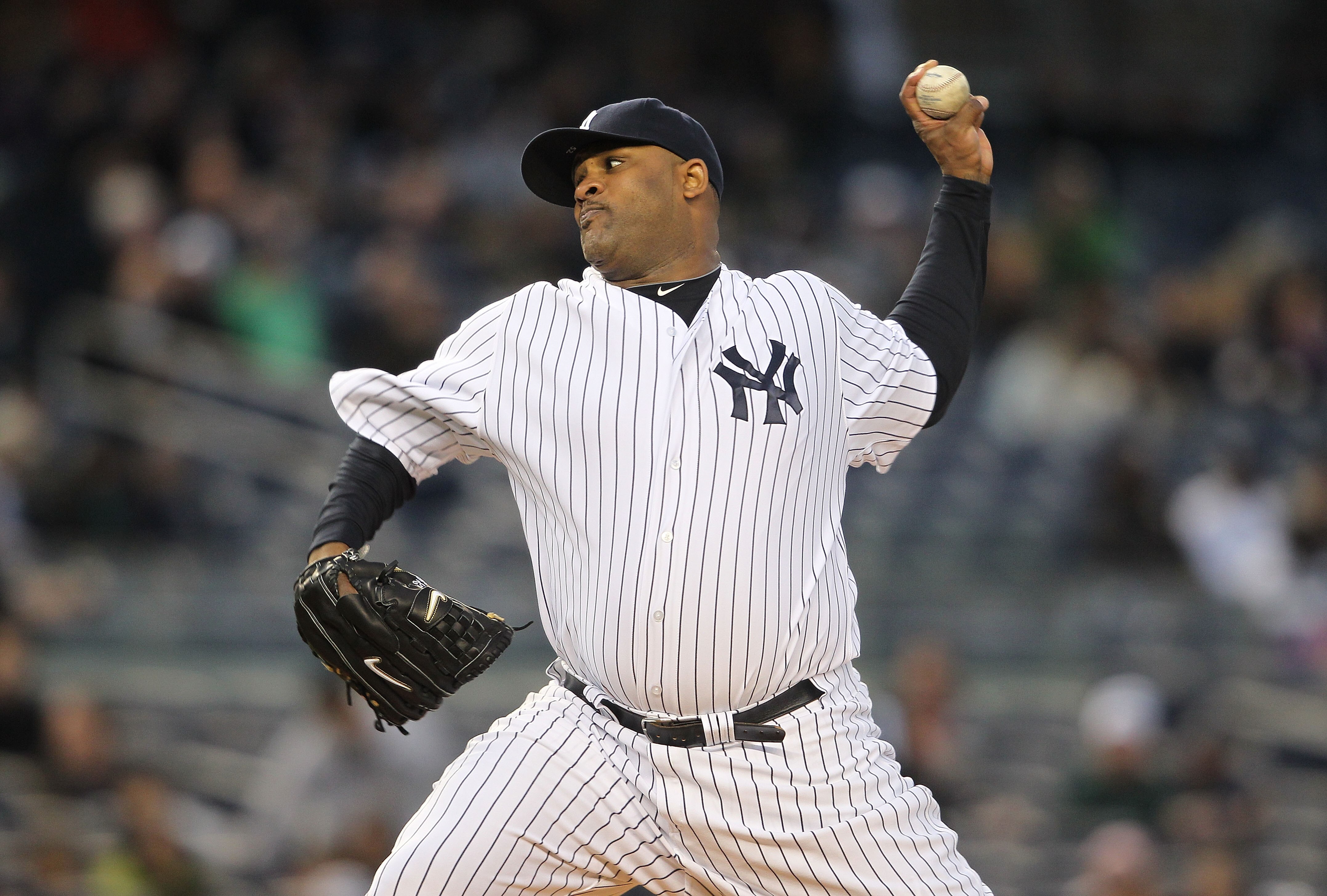 NEW YORK, NY - APRIL 05:  CC Sabathia #52 of the New York Yankees pitches against the Minnesota Twins at Yankee Stadium on April 3, 2011 in the Bronx borough of New York City.  (Photo by Nick Laham/Getty Images)