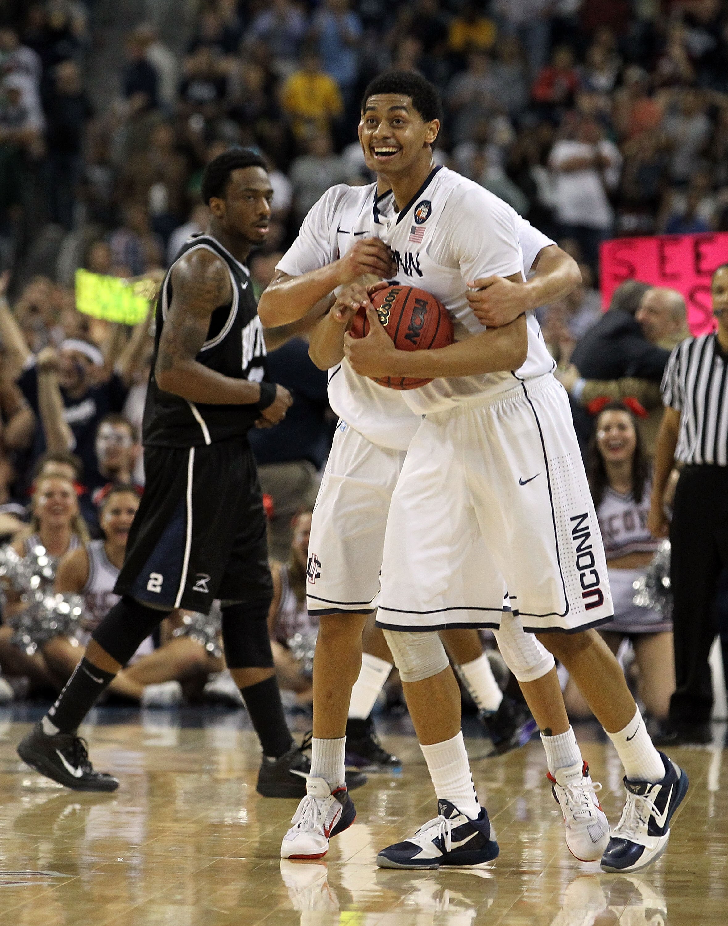 HOUSTON, TX - APRIL 04:  Shabazz Napier #13 and Jeremy Lamb #3 of the Connecticut Huskies celebrate after defeating the Butler Bulldogs to win the National Championship Game of the 2011 NCAA Division I Men's Basketball Tournament by a score of 53-41 at Re
