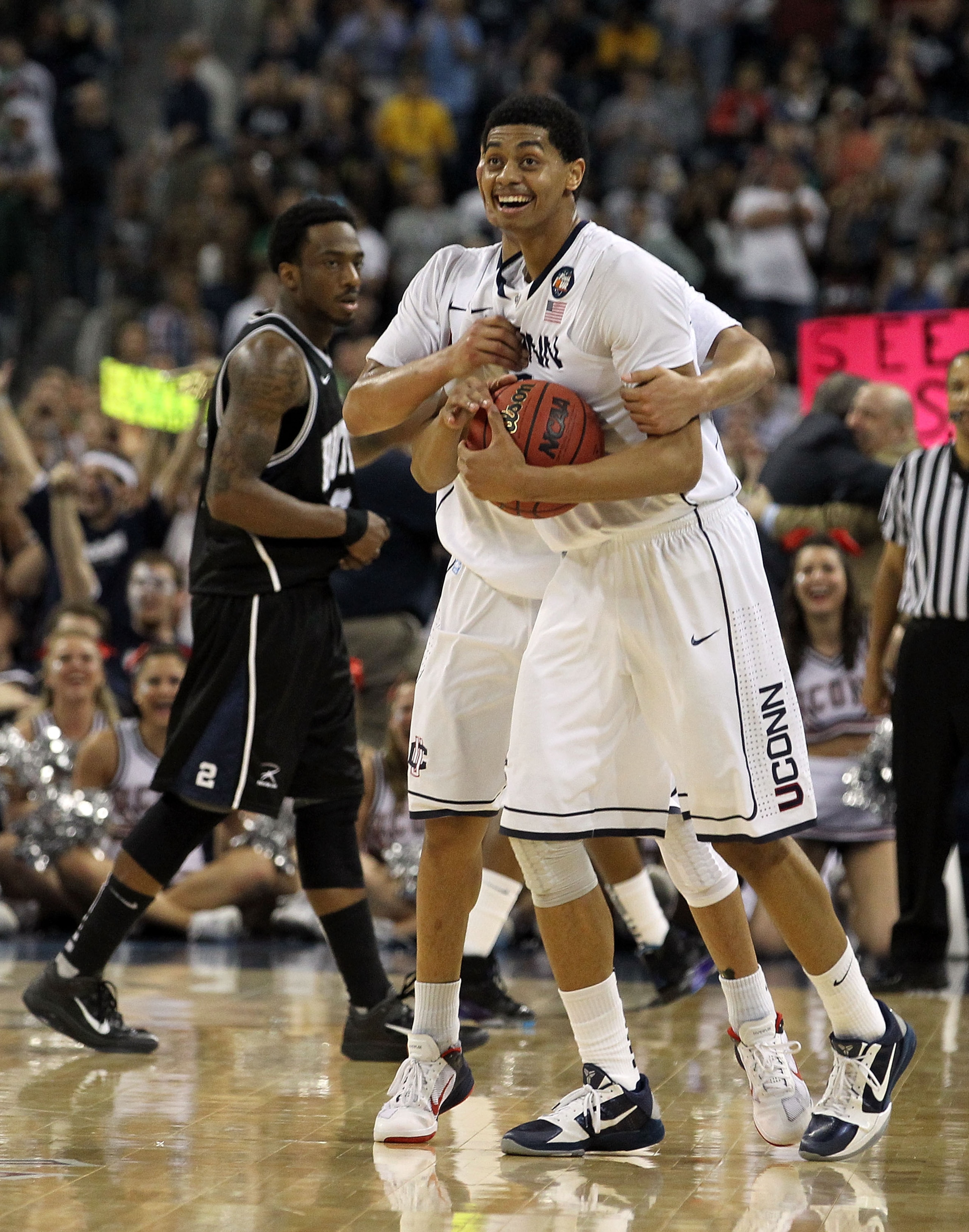 HOUSTON, TX - APRIL 04:  Shabazz Napier #13 and Jeremy Lamb #3 of the Connecticut Huskies celebrate after defeating the Butler Bulldogs to win the National Championship Game of the 2011 NCAA Division I Men's Basketball Tournament by a score of 53-41 at Re