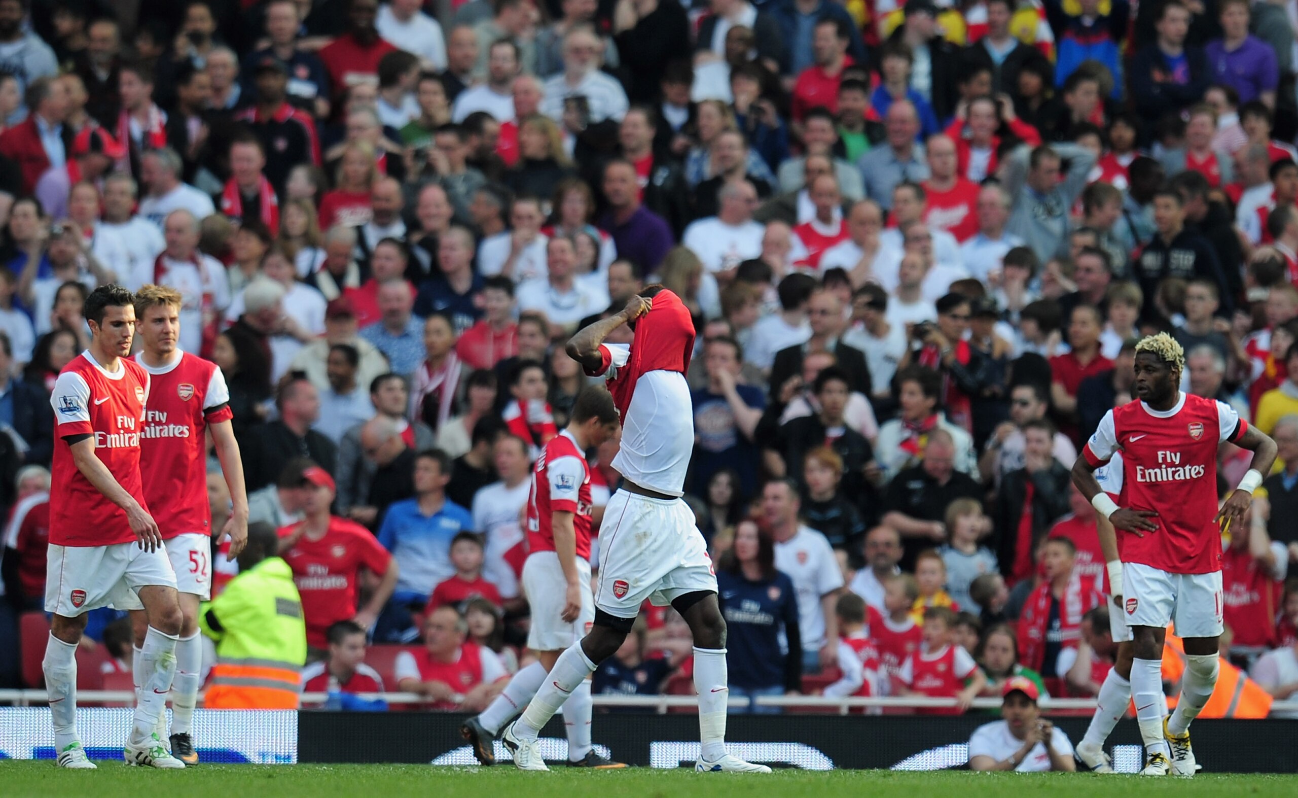 LONDON, ENGLAND - APRIL 17: Dejected Johan Djourou of Arsenal after referee Andre Marriner awards Liverpool a penalty kick and they equalise during the Barclays Premier League match between Arsenal and Liverpool at the Emirates Stadium on April 17, 2011 LONDON, ENGLAND - APRIL 17: Dejected Johan Djourou of Arsenal after referee Andre Marriner awards Liverpool a penalty kick and they equalise during the Barclays Premier League match between Arsenal and Liverpool at the Emirates Stadium on April 17, 2011