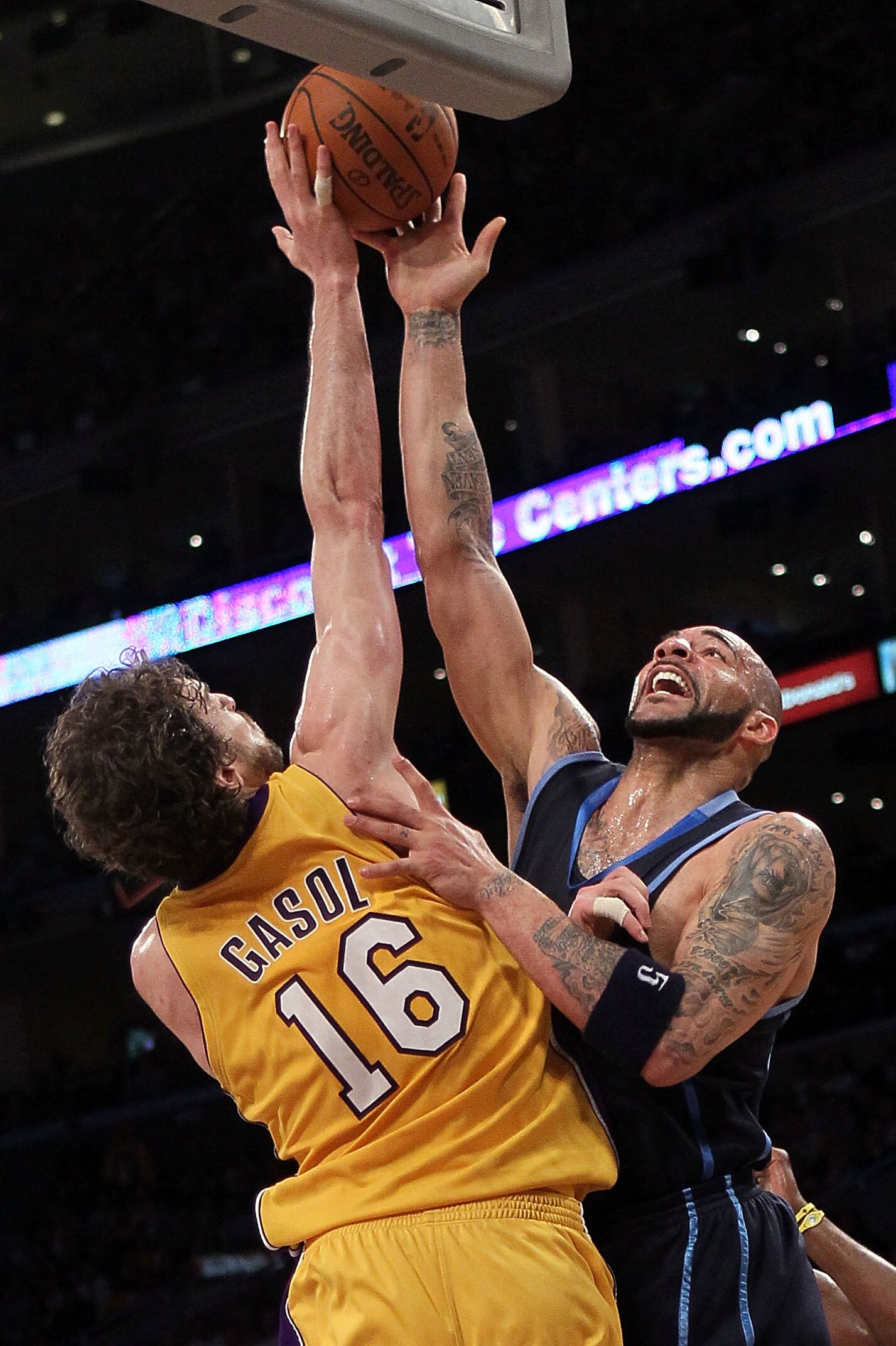 LOS ANGELES, CA - MAY 04:  Pau Gasol #16 of the Los Angeles Lakers blocks the shot of Carlos Boozer #5 of the Utah Jazz in the first half during Game Two of the Western Conference Semifinals of the 2010 NBA Playoffs at Staples Center on May 4, 2010 in Los