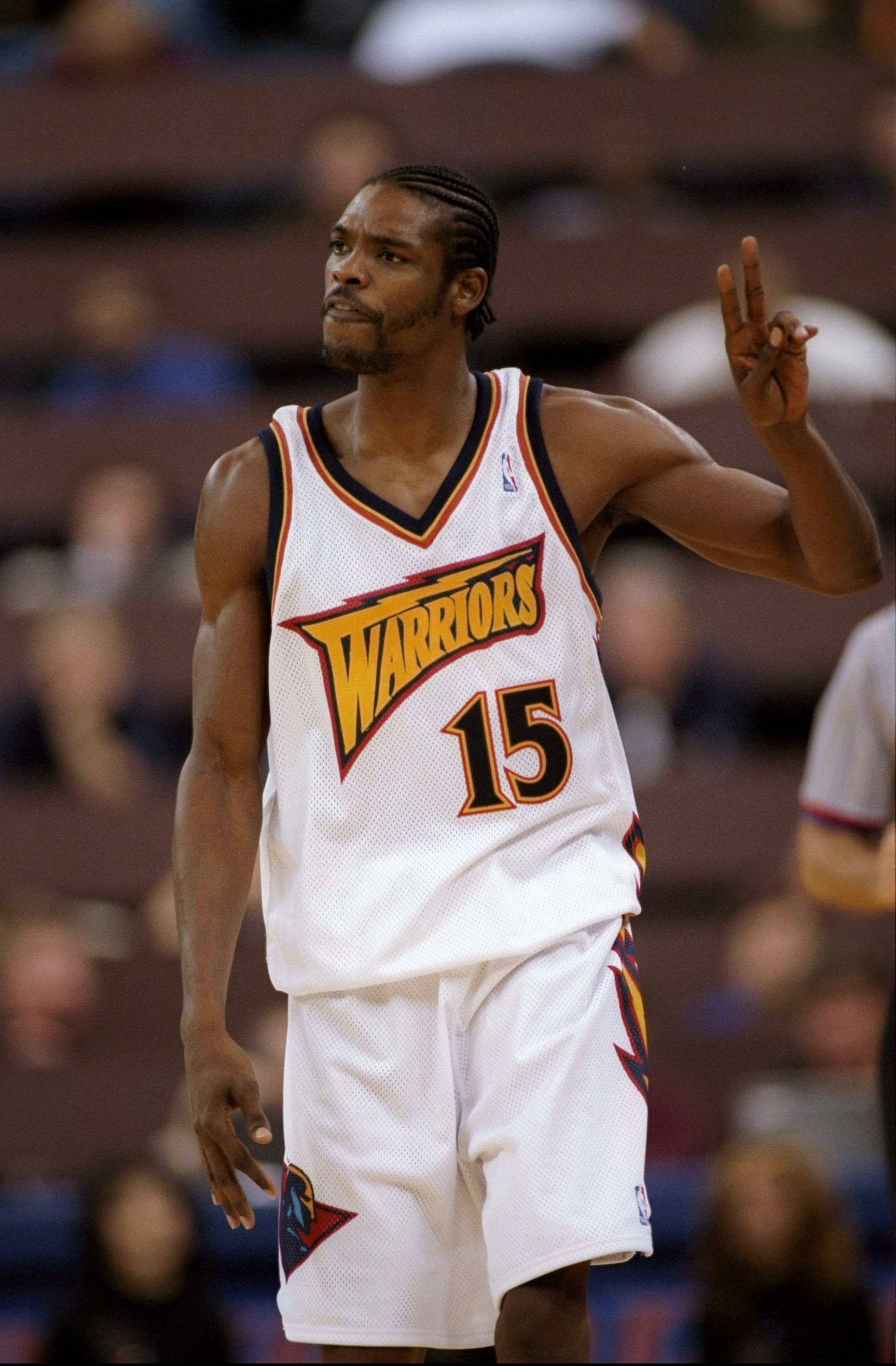 12 Nov 1997:  Latrell Sprewell #15 of the Golden State Warriors gestures during the Warriors 102-71 loss to the Detroit Pistons at the Oakland Coliseum in Oakland, California.    Mandatory Credit: Otto Greule Jr./Allsport