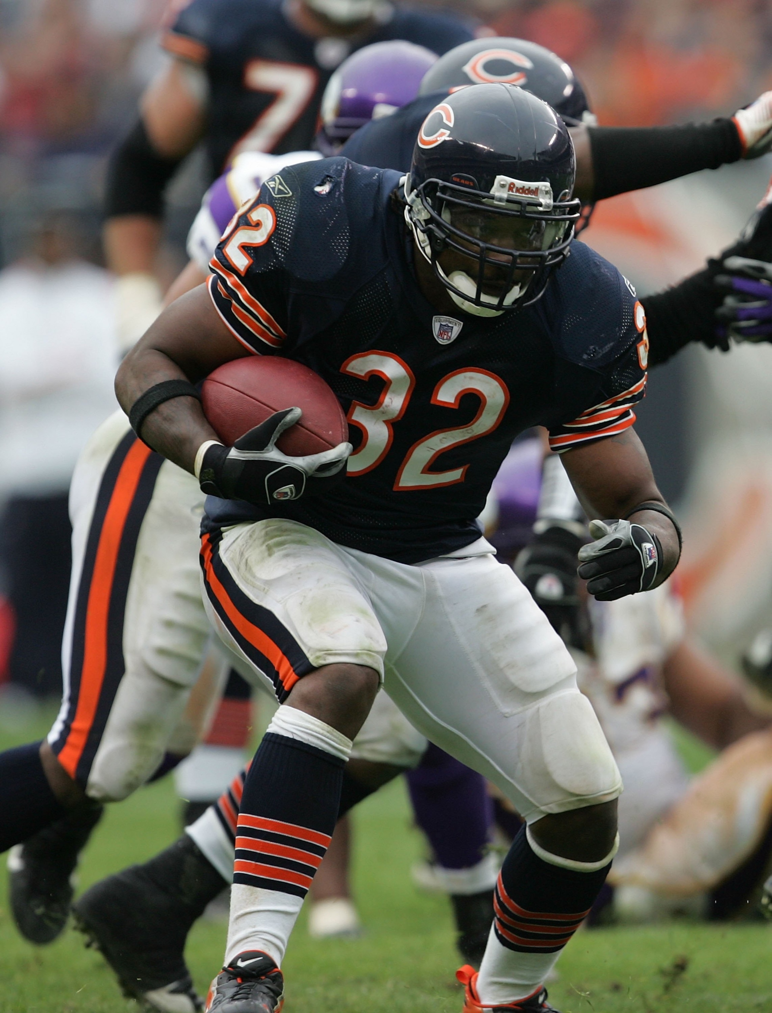 CHICAGO - OCTOBER 14: Cedric Benson #32 of the Chicago Bears runs against the Minnesota Vikings on October 14, 2007 at Soldier Field in Chicago, Illinois. The Vikings defeated the Bears 34-31. (Photo by Jonathan Daniel/Getty Images) CHICAGO - OCTOBER 14: Cedric Benson #32 of the Chicago Bears runs against the Minnesota Vikings on October 14, 2007 at Soldier Field in Chicago, Illinois. The Vikings defeated the Bears 34-31. (Photo by Jonathan Daniel/Getty Images)
