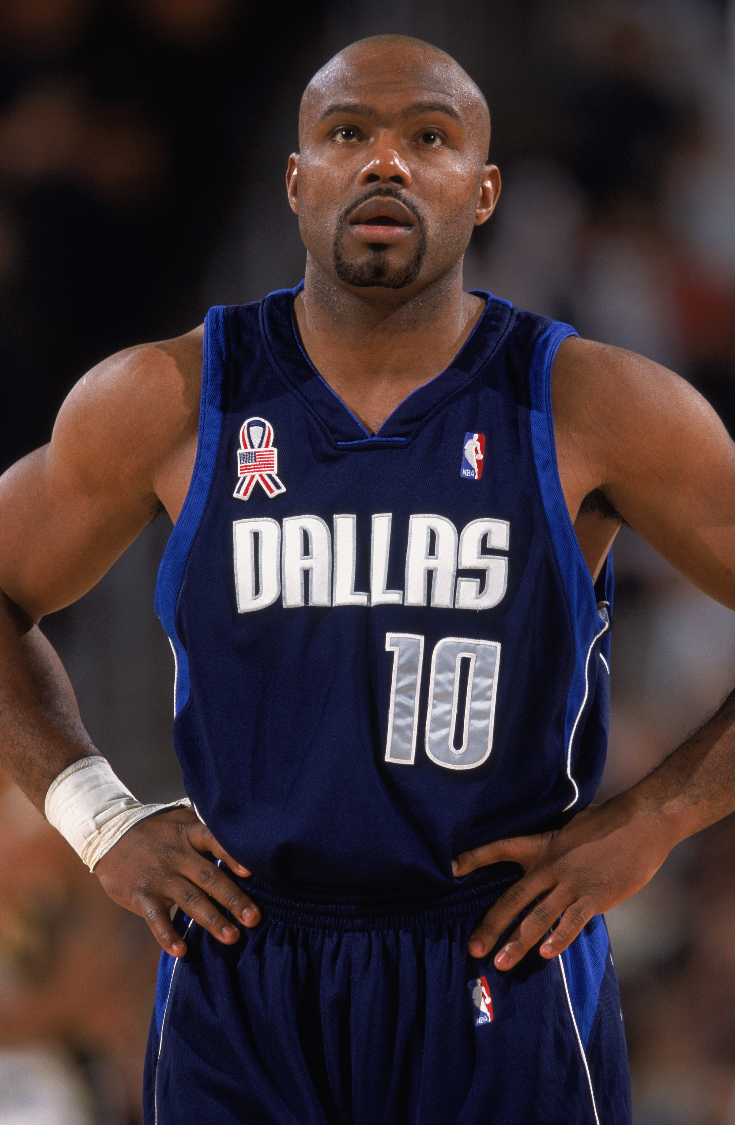 SEATTLE - FEBRUARY 12:  Portrait of point guard Tim Hardaway #10 of the Dallas Mavericks as he looks on during an NBA game against the Seattle SuperSonics at the Key Arena on February 12, 2002 in Seattle, Washington. The Mavericks defeated the Sonics 112-