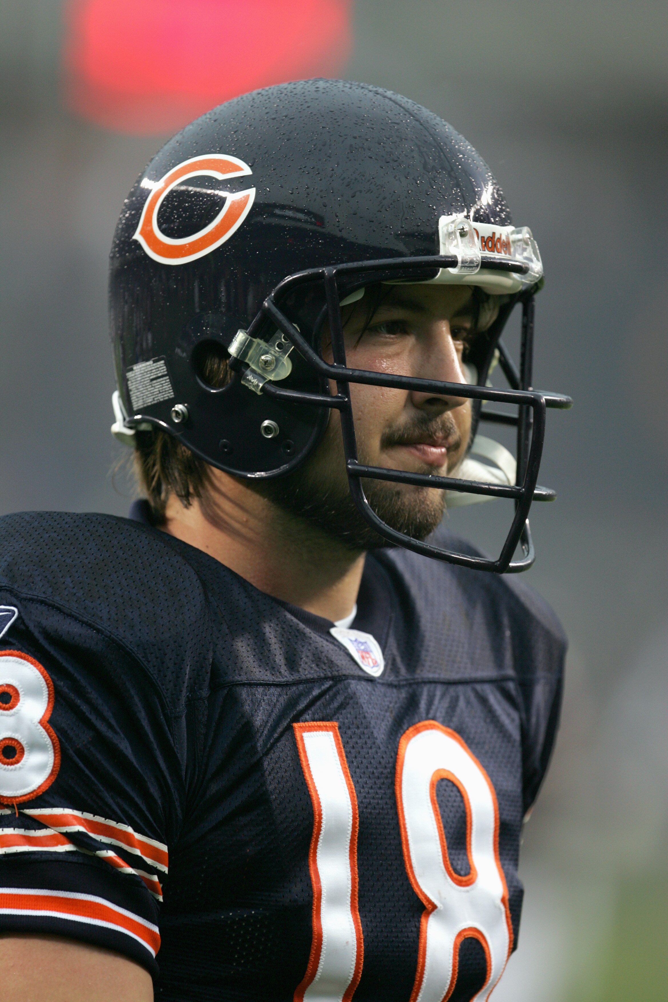 CHICAGO - AUGUST 18:  Quarterback Kyle Orton #18 of the Chicago Bears looks on the field during a preseason game against the San Diego Chargers on August 18, 2006 at Soldier Field in Chicago, Illinois.  (Photo by Jonathan Daniel/Getty Images)