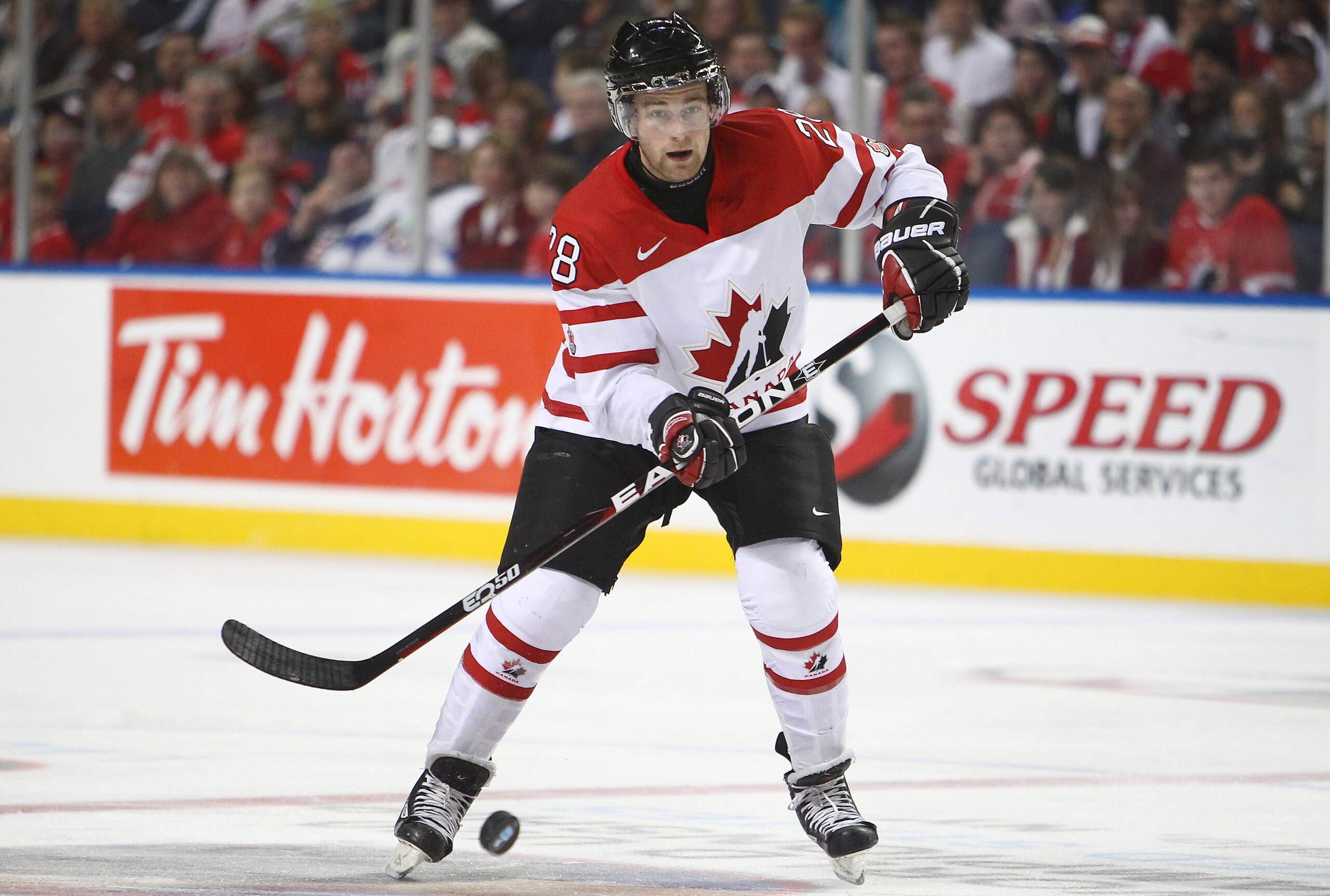 BUFFALO, NY - DECEMBER 31: Forward Brett Connolly #28 of Canada flips the puck in during the 2011 IIHF World U20 Championship game between Canada and Sweden on December 31, 2010 at HSBC Arena in Buffalo, New York. (Photo by Tom Szczerbowski/Getty Images)