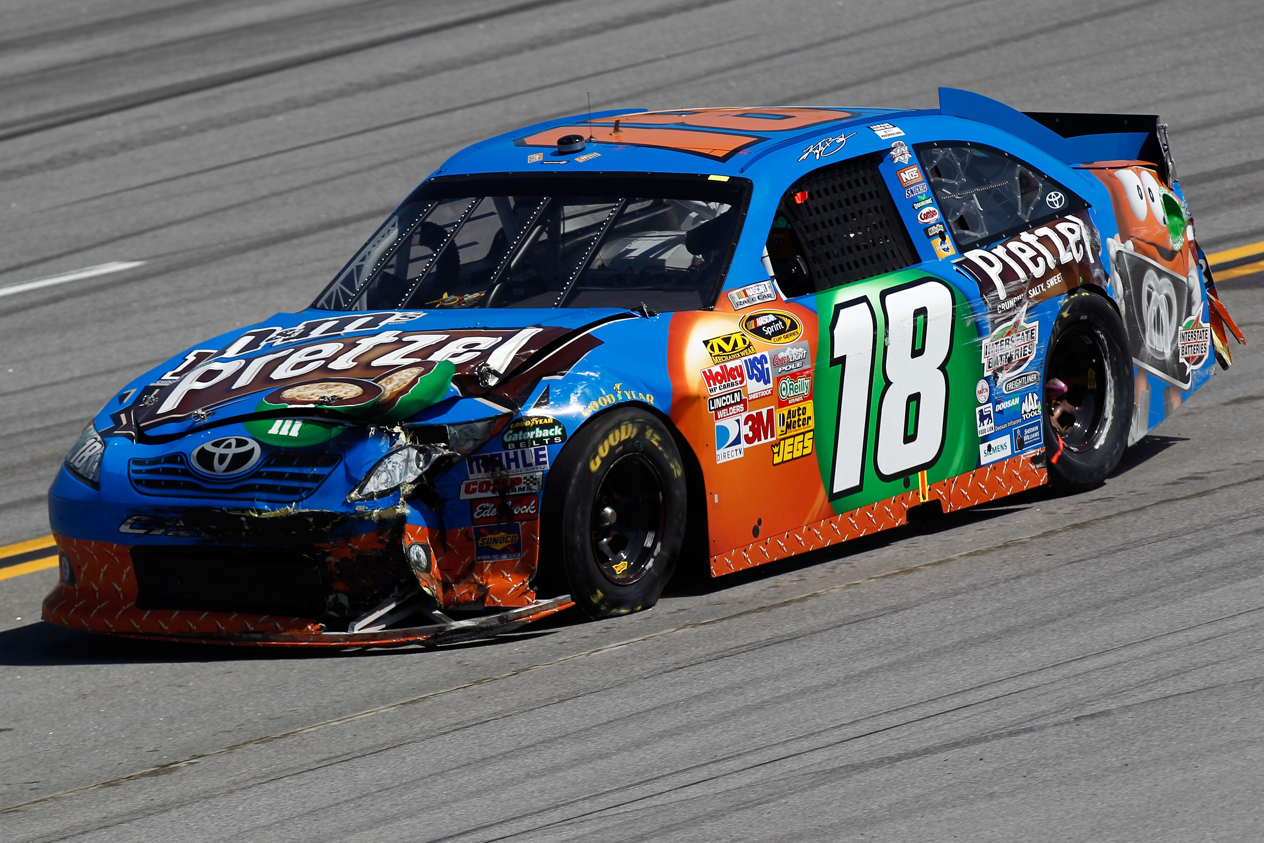 TALLADEGA, AL - APRIL 17:  Kyle Busch drives the wrecked #18 M&M's Pretzel Toyota after an incident in the NASCAR Sprint Cup Series Aaron's 499 at Talladega Superspeedway on April 17, 2011 in Talladega, Alabama.  (Photo by Jeff Zelevansky/Getty Images for