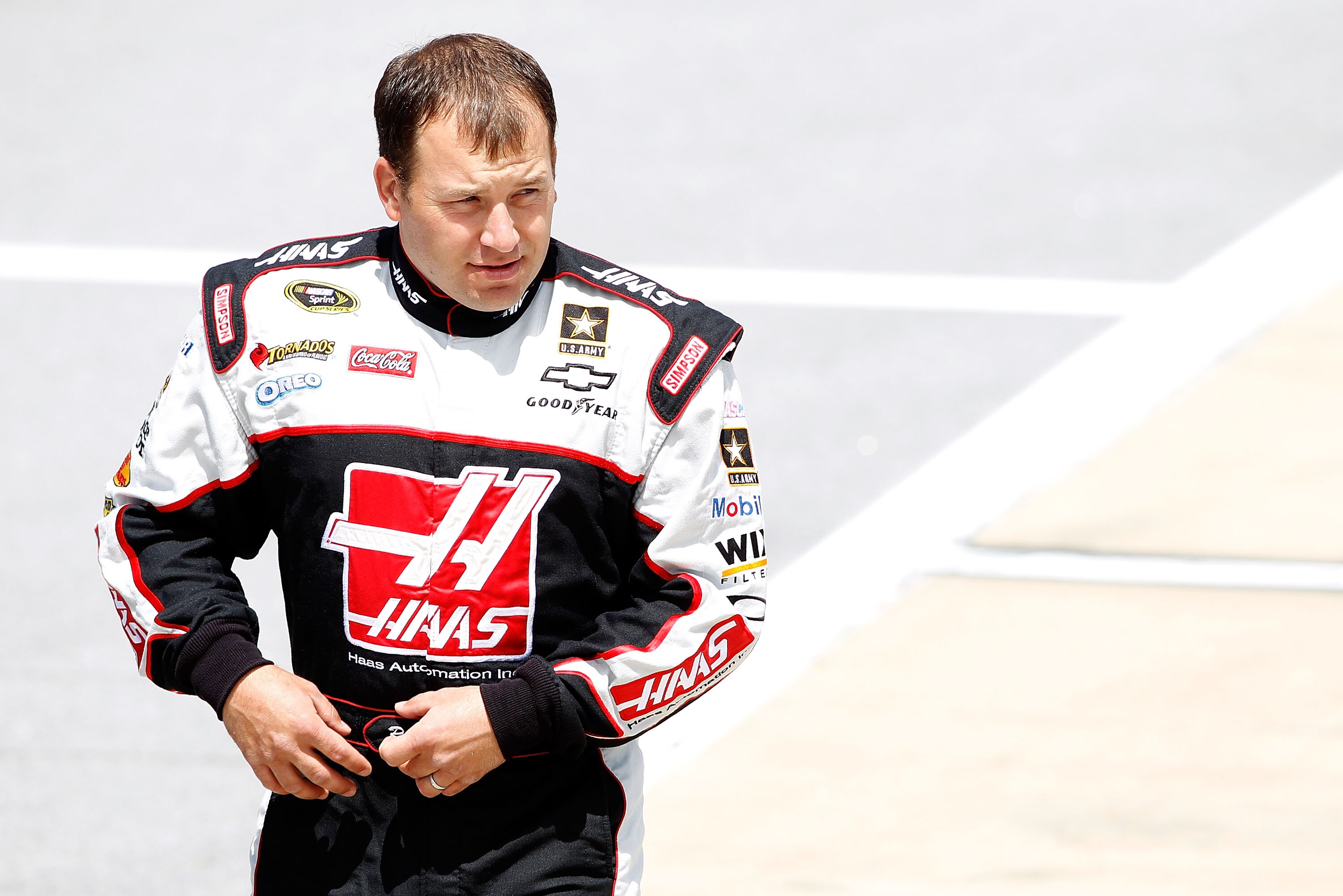 TALLADEGA, AL - APRIL 16:  Ryan Newman, driver of the #39 Haas Automation Chevrolet, walks on the grid during qualifying for the NASCAR Sprint Cup Series Aaron's 499 at Talladega Superspeedway on April 16, 2011 in Talladega, Alabama.  (Photo by Todd Warsh
