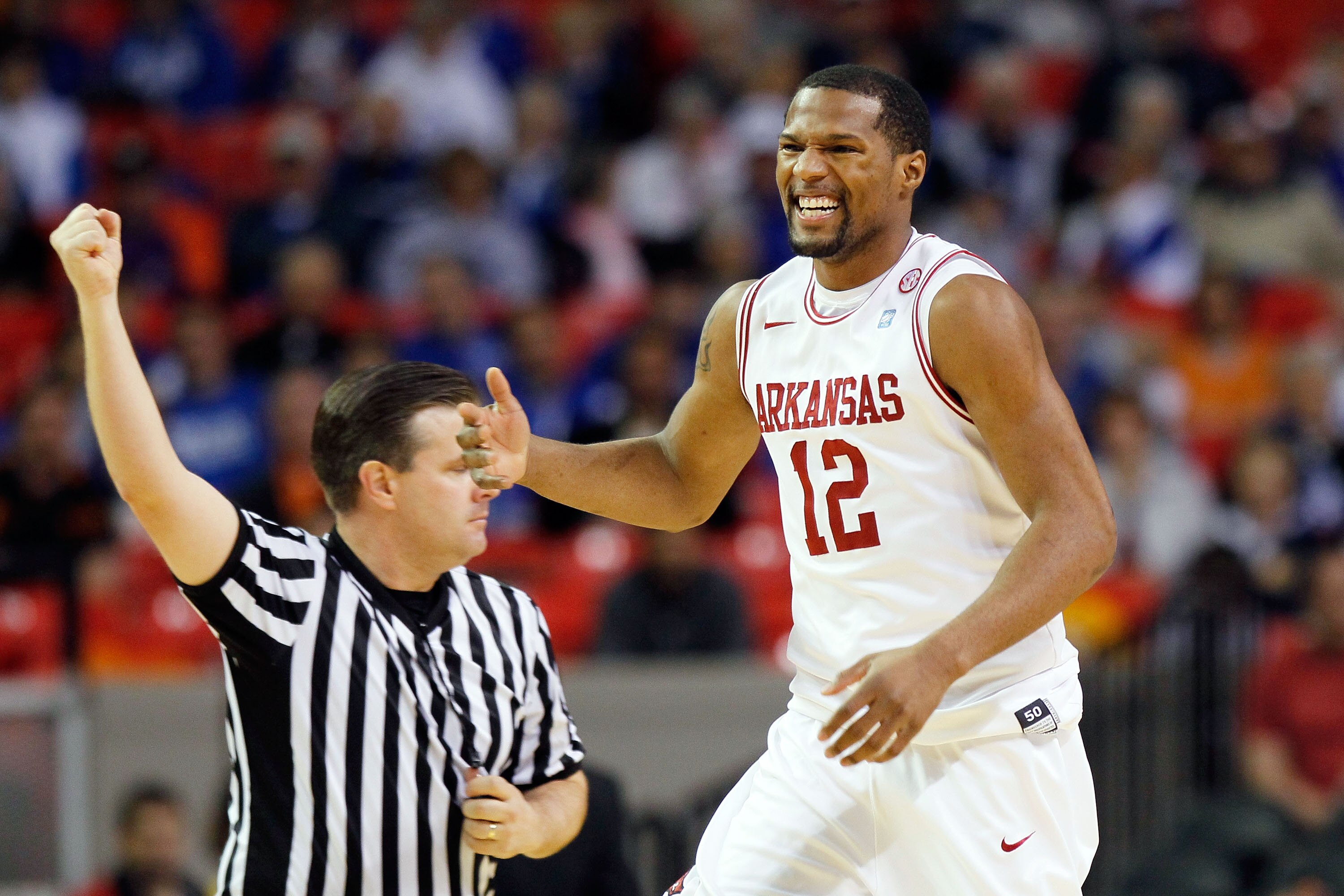 ATLANTA, GA - MARCH 10:  Marcus Britt #12 of the Arkansas Razorbacks reacts to a call during their game against the Tennessee Volunteers in the first round of the SEC Men's Basketball Tournament at the Georgia Dome on March 10, 2011 in Atlanta, Georgia.