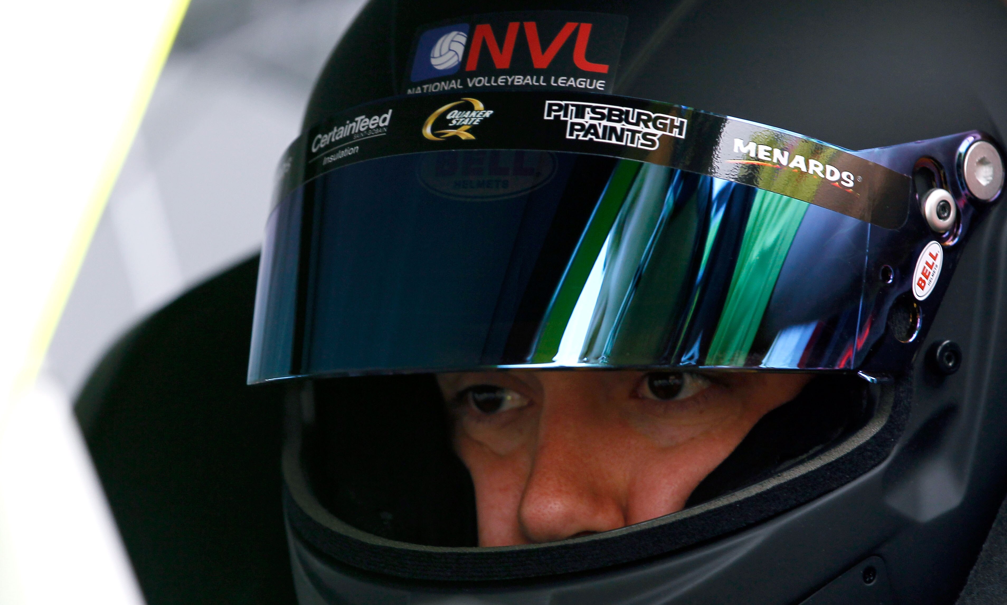 TALLADEGA, AL - APRIL 15:  Paul Menard, driver of the #27 Schrock Cabinetry/Menards Chevrolet, sits in his car in the garage during practice for the NASCAR Sprint Cup Series Aaron's 499 at Talladega Superspeedway on April 15, 2011 in Talladega, Alabama.