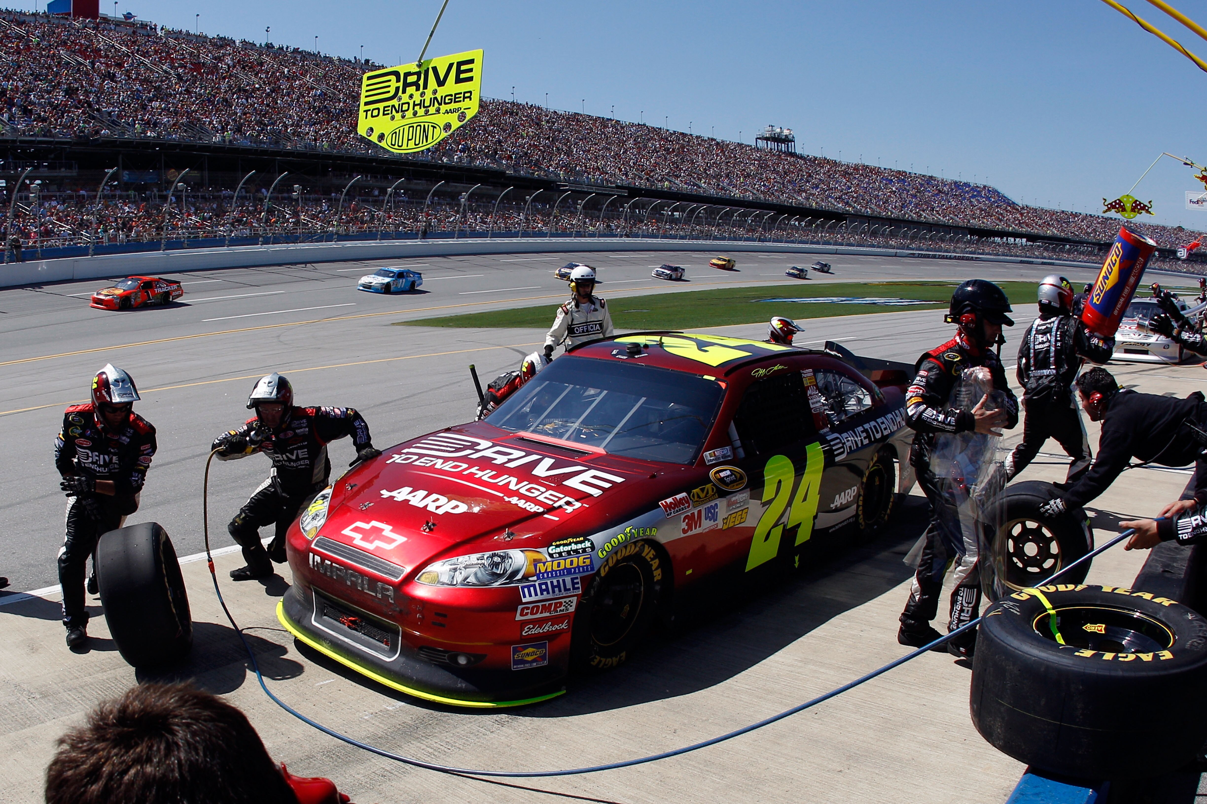 TALLADEGA, AL - APRIL 17:  Jeff Gordon, driver of the #24 Drive to End Hunger/AARP Chevrolet, pits during the NASCAR Sprint Cup Series Aaron's 499 at Talladega Superspeedway on April 17, 2011 in Talladega, Alabama.  (Photo by Chris Graythen/Getty Images)
