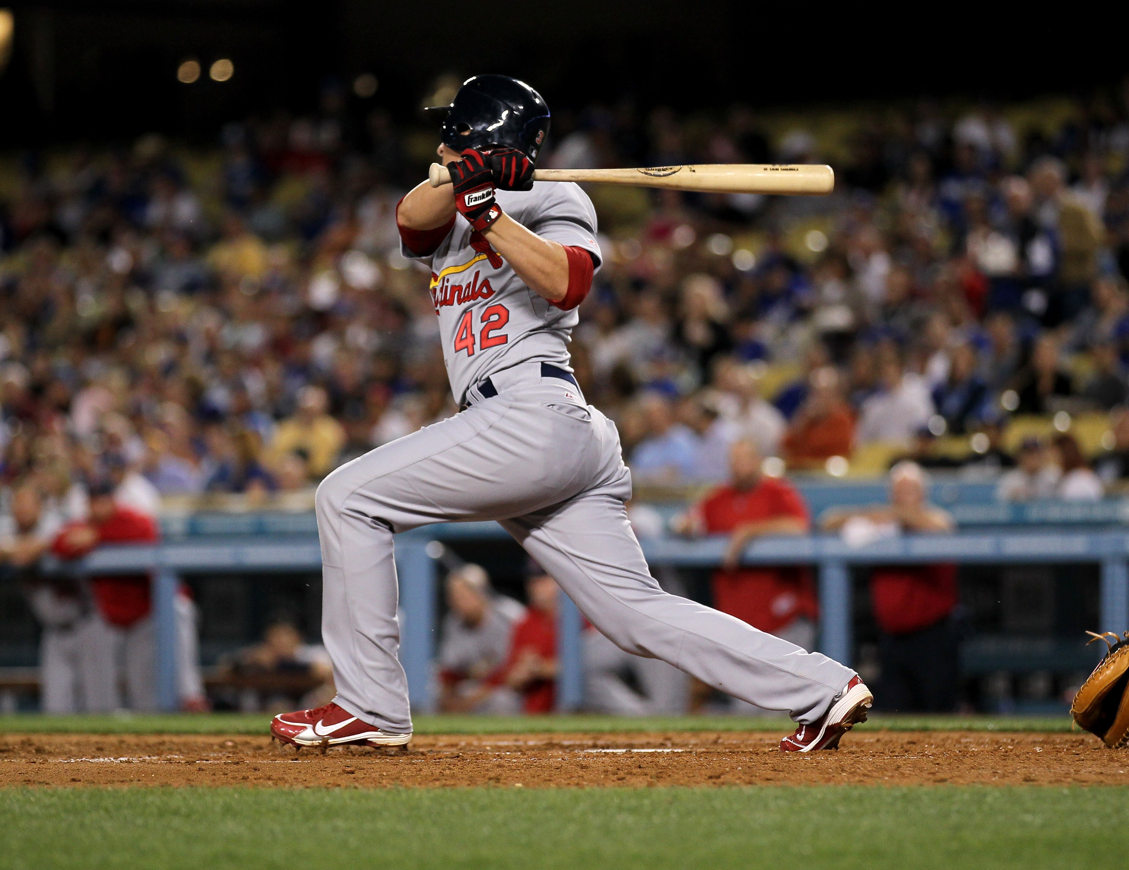 LOS ANGELES - APRIL 15: Ryan Theriot #3 of the St. Louis Cardinals hits an RBI single in the fourth inning against the Los Angeles Dodgers on April 15, 2011 at Dodger Stadium in Los Angeles, California.   (Photo by Stephen Dunn/Getty Images)