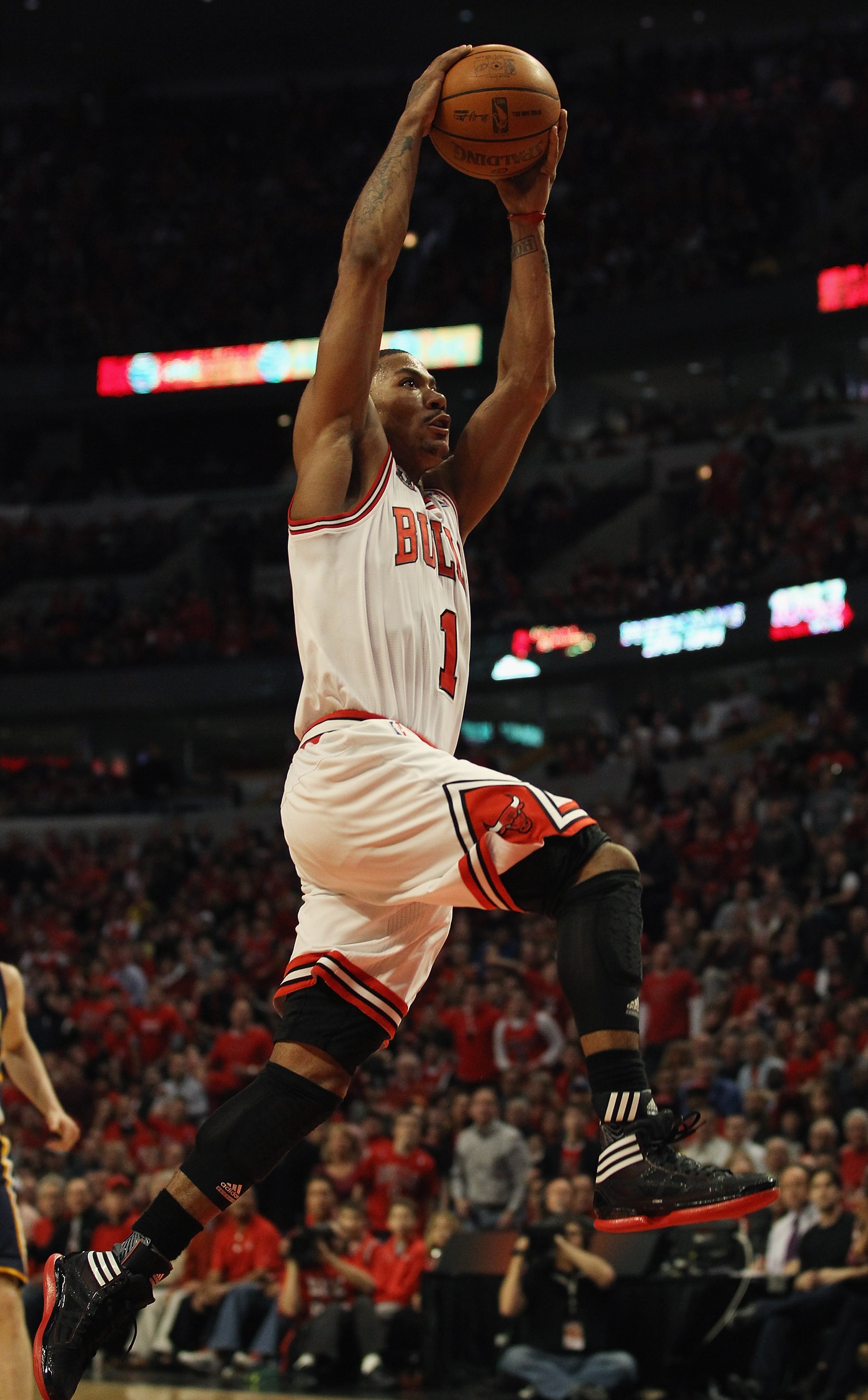 CHICAGO, IL - APRIL 16: Derrick Rose #1 of the Chicago Bulls goes up for a dunk against the Indiana Pacers in Game One of the Eastern Conference Quarterfinals in the 2011 NBA Playoffs at the United Center on April 16, 2011 in Chicago, Illinois. The Bulls