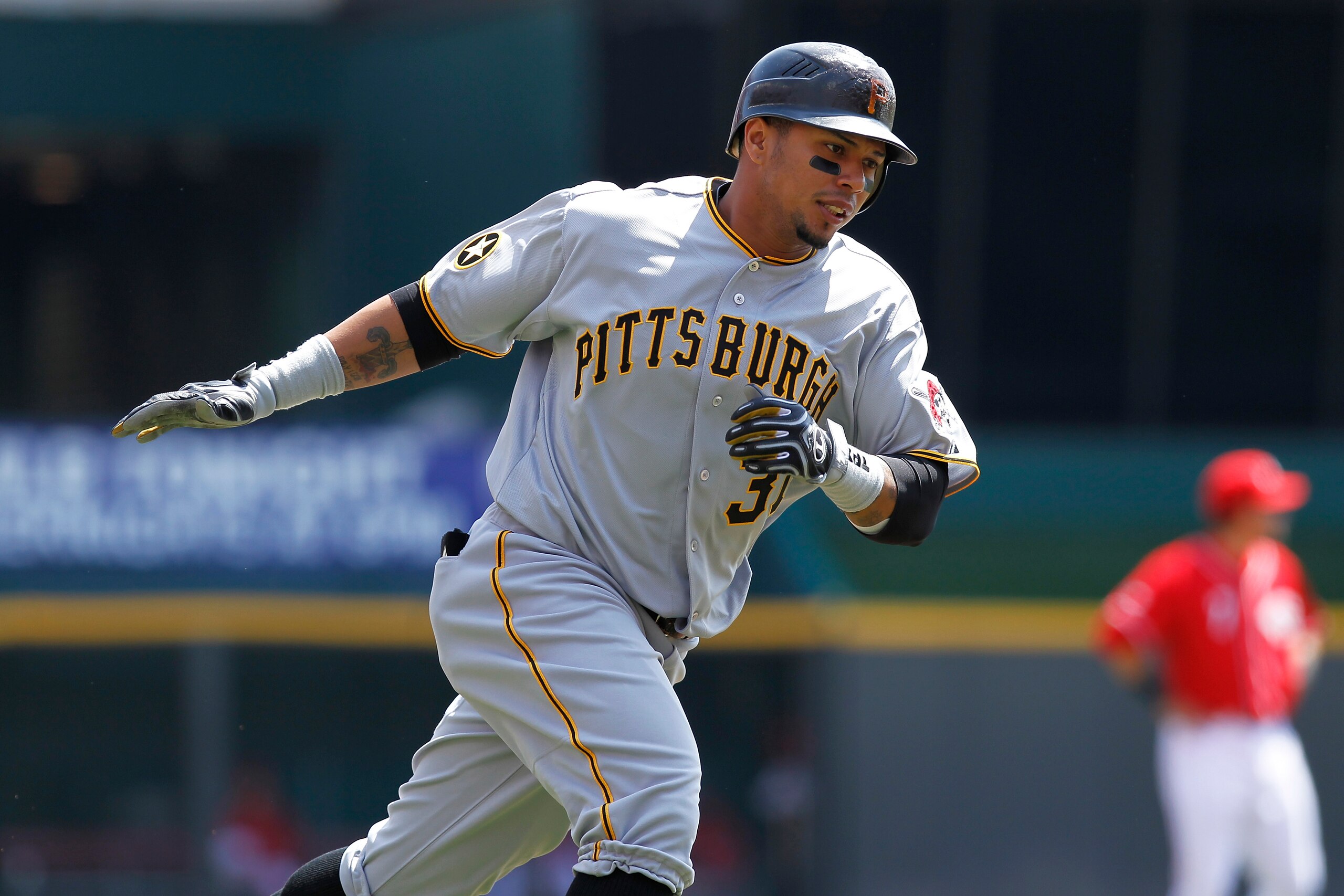 CINCINNATI, OH - APRIL 17: Jose Tabata #31 of the Pittsburgh Pirates rounds the bases after a home run in the first inning against the Cincinnati Reds at Great American Ball Park on April 17, 2011 in Cincinnati, Ohio. The Pirates won 7-6. (Photo by Joe Ro