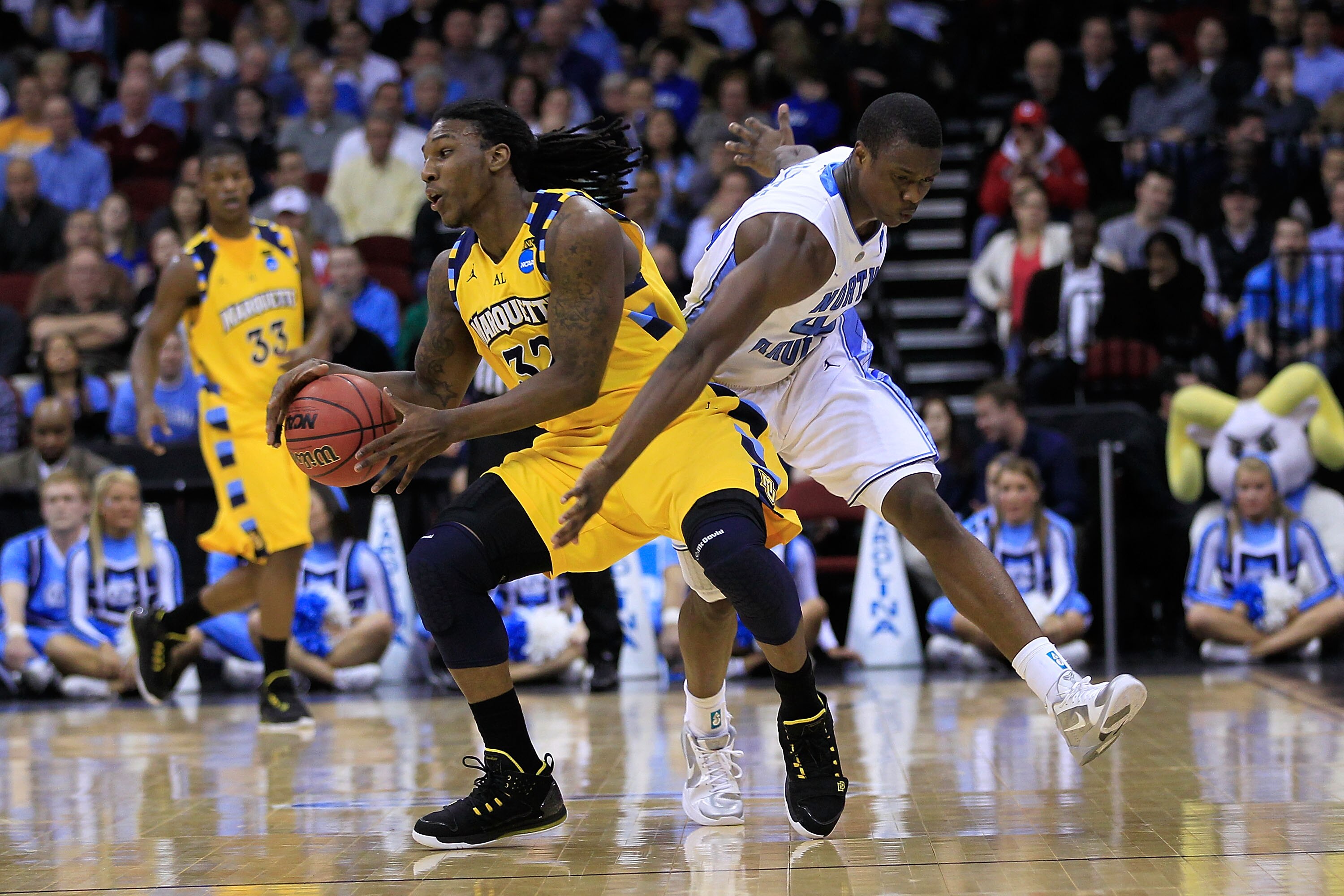 NEWARK, NJ - MARCH 25:  Jae Crowder #32 of the Marquette Golden Eagles in action against the North Carolina Tar Heels during the east regional semifinal of the 2011 NCAA Men's Basketball Tournament at the Prudential Center on March 25, 2011 in Newark, New