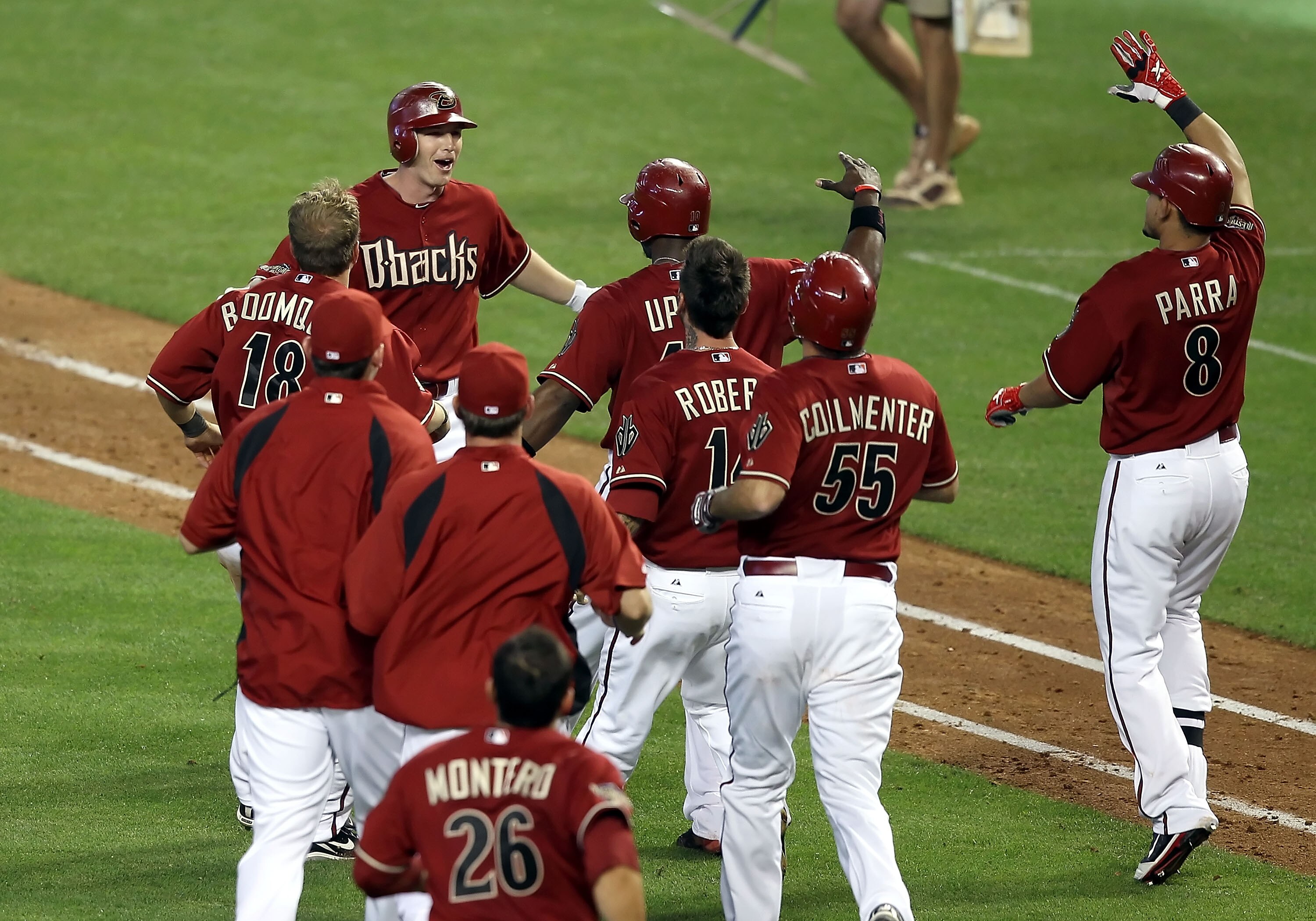 PHOENIX, AZ - APRIL 17:  Stephen Drew #6 of the Arizona Diamondbacks celebrates with teammates after his game winning RBI single during the twelfth inning of the Major League Baseball game against the San Francisco Giants at Chase Field on April 17, 2011 
