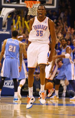 OKLAHOMA CITY, OK - APRIL 17: Kevin Durant #35 of the Oklahoma City Thunder celebrates a three-point shot against the Denver Nuggets in Game One of the Western Conference Quarterfinals in the 2011 NBA Playoffs on April 17, 2011 at the Ford Center in Oklah