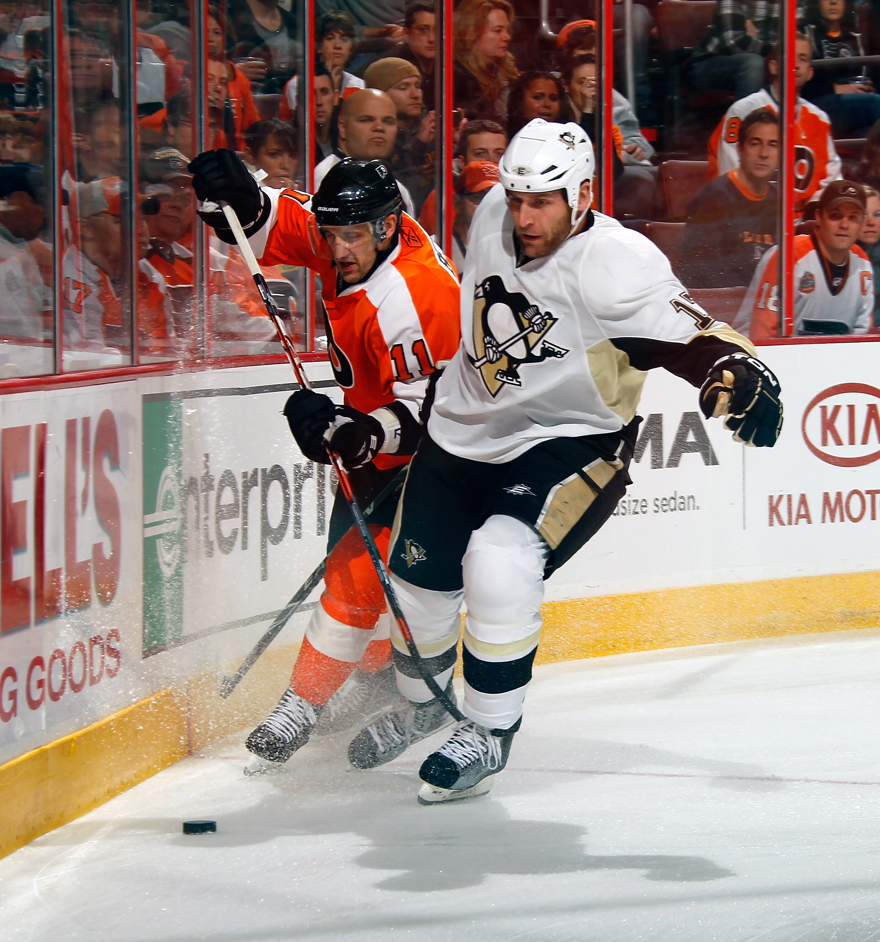 PHILADELPHIA, PA - MARCH 24:  Mike Rupp #17 of the Pittsburgh Penguins and Blair Betts #11 of the Philadelphia Flyers skate for the puck during a game on March 24, 2011 at the Wells Fargo Center in Philadelphia, Pennsylvania.  (Photo by Lou Capozzola/Gett